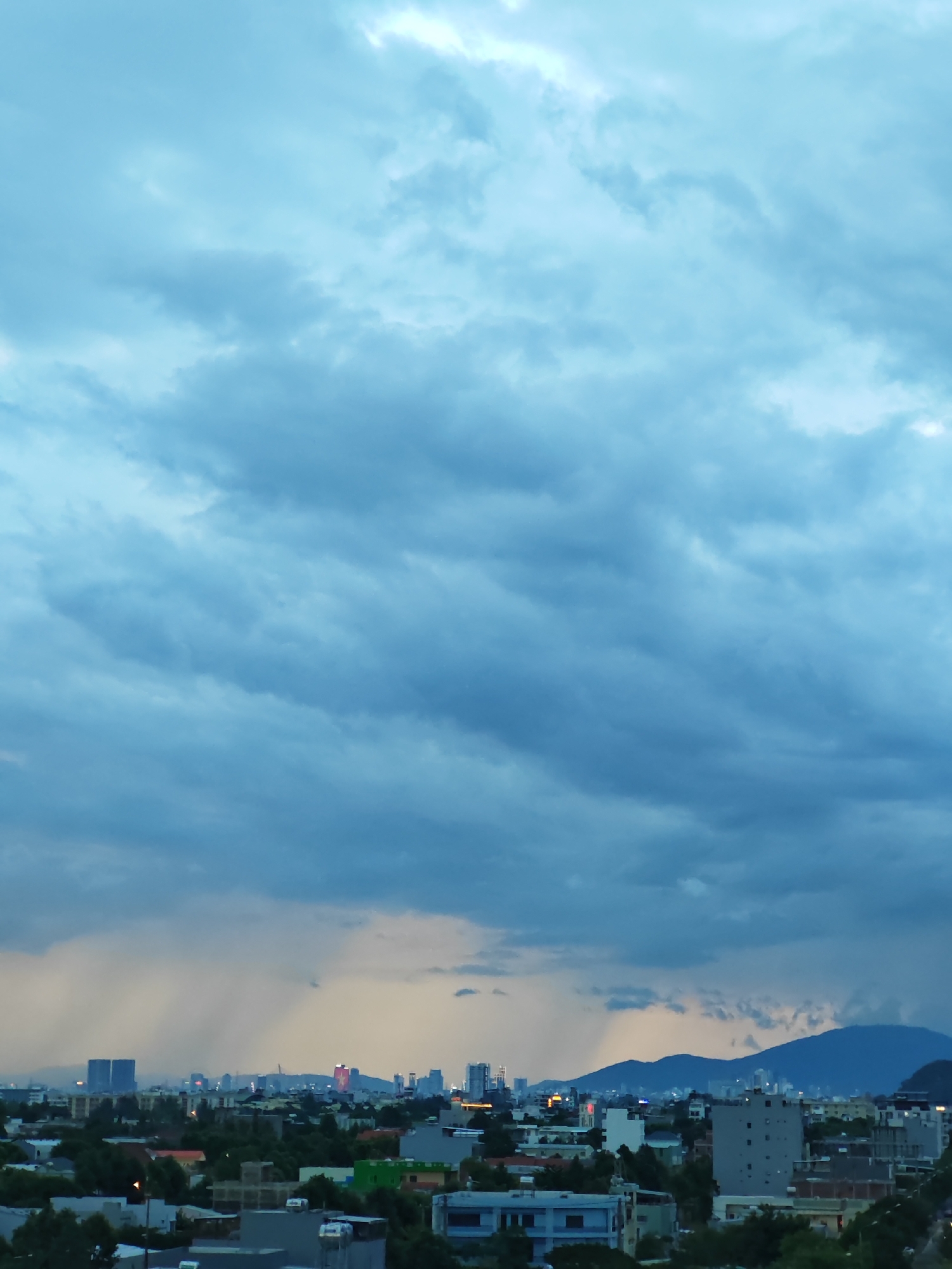 Đà Nẵng cityscape under a dramatic dusk sky