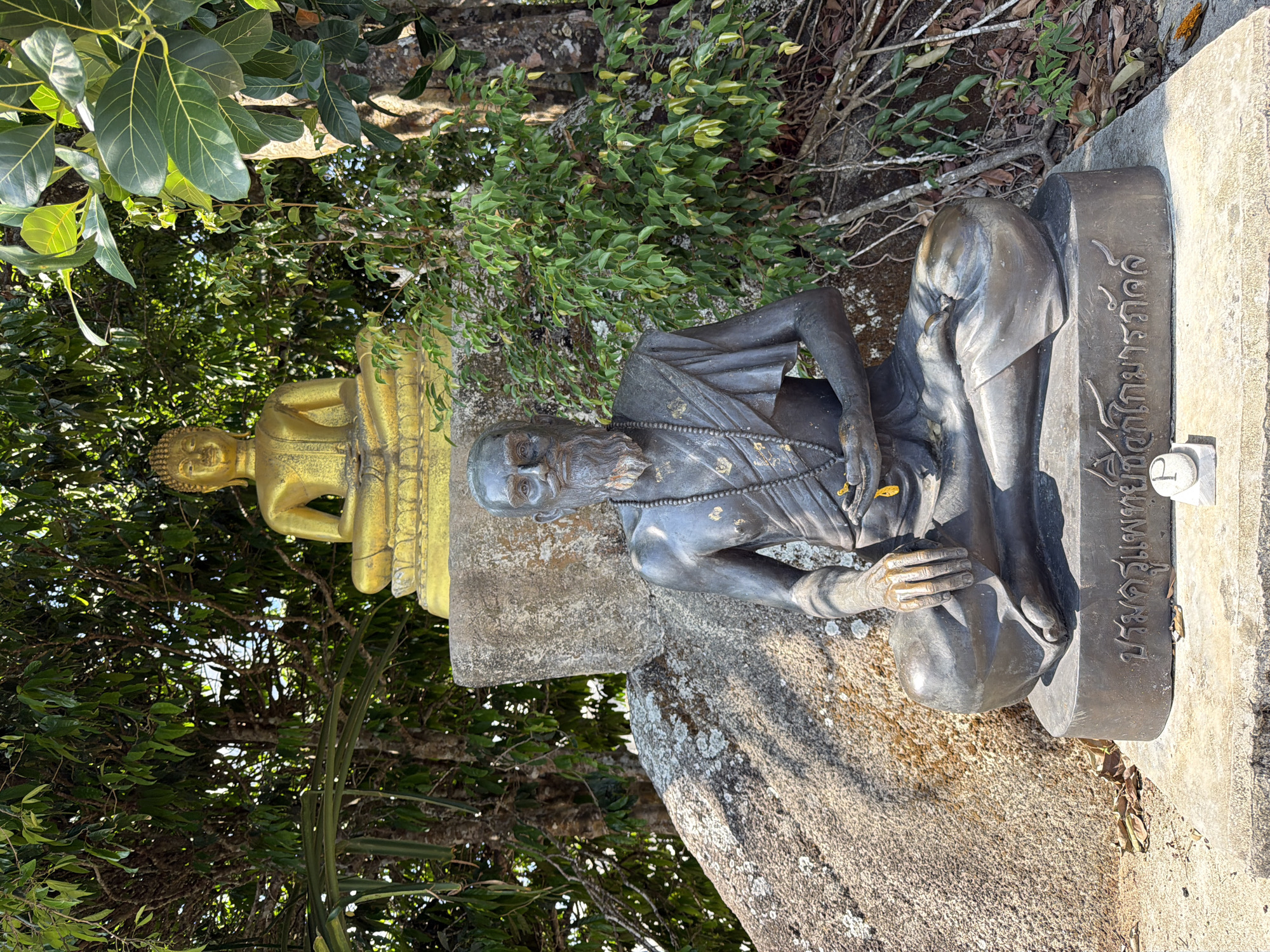 Tourist visits Big Buddha and religious sites in Karon, Thailand