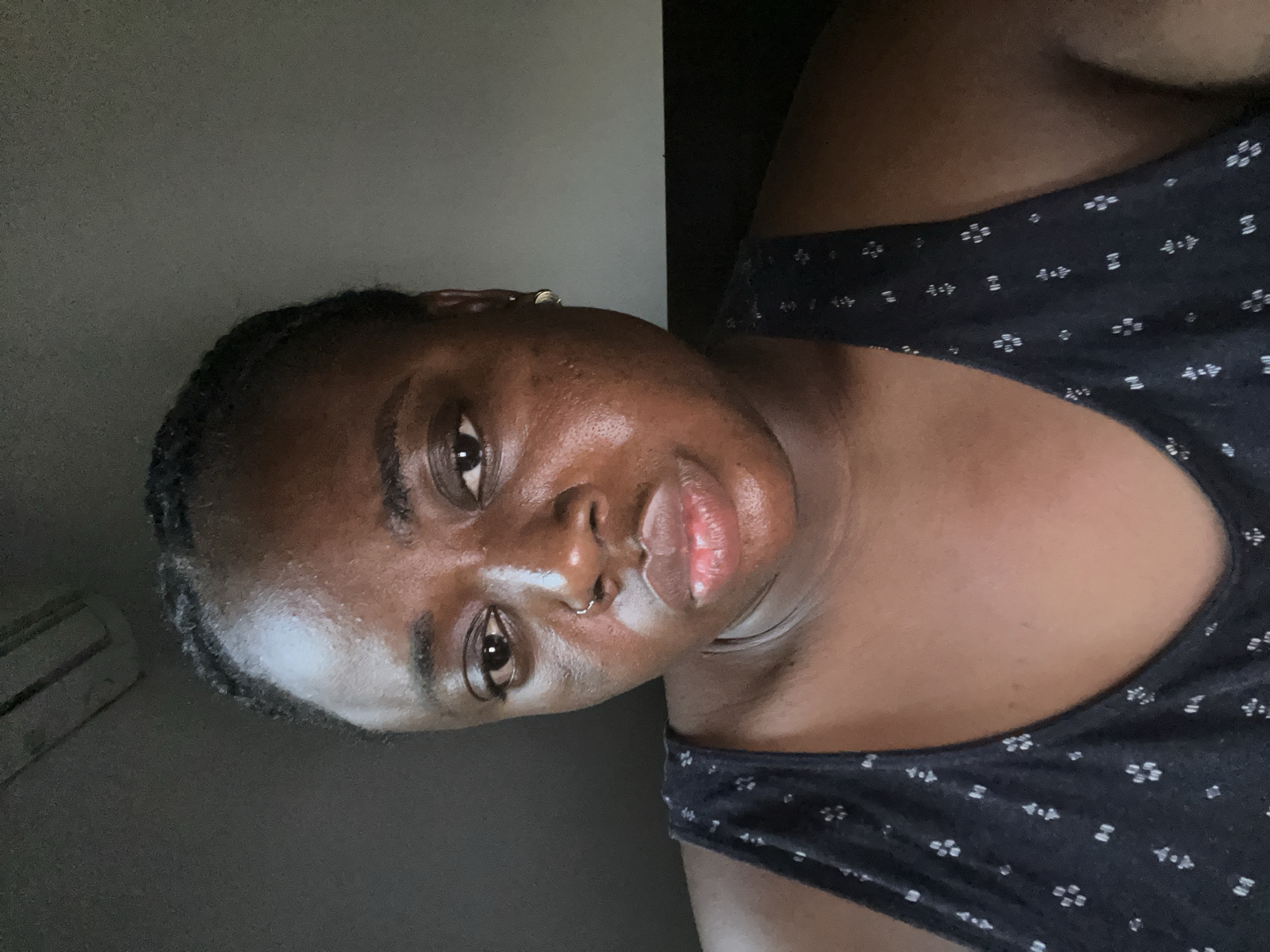 Woman takes selfies in Abuja apartment