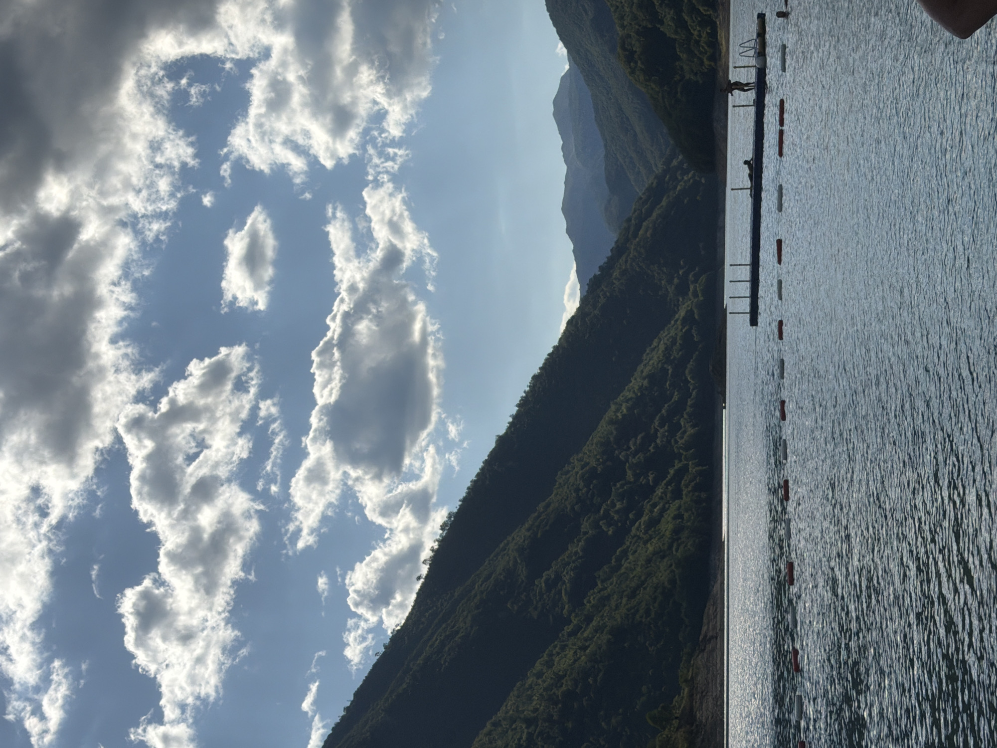 Lazy summer day on Piva Lake's pebble beach