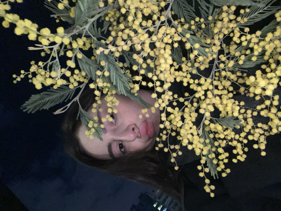 Young woman captures evening moments across Moscow through selfie series