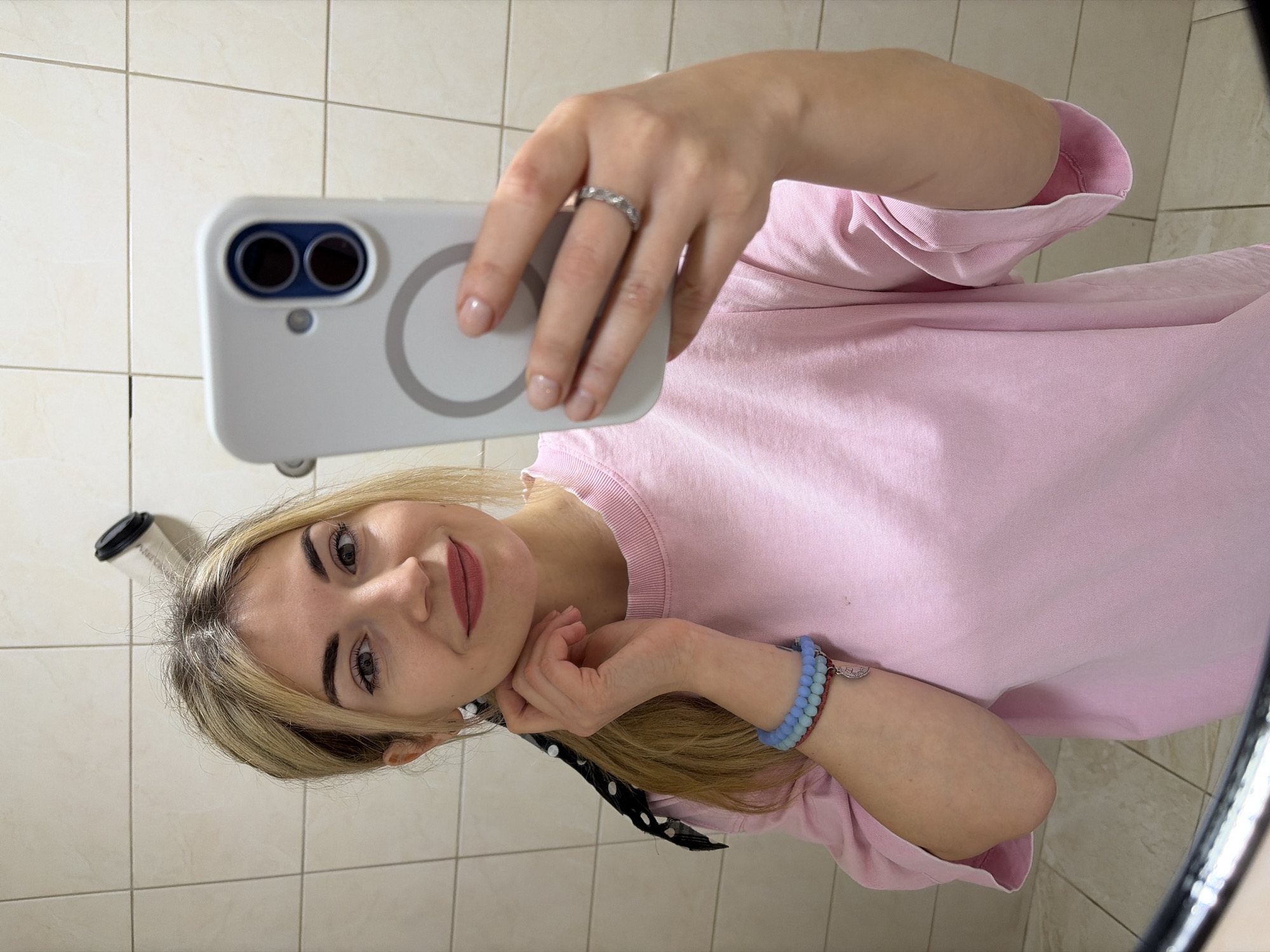 Woman documents morning routine in Budva, Montenegro cafes