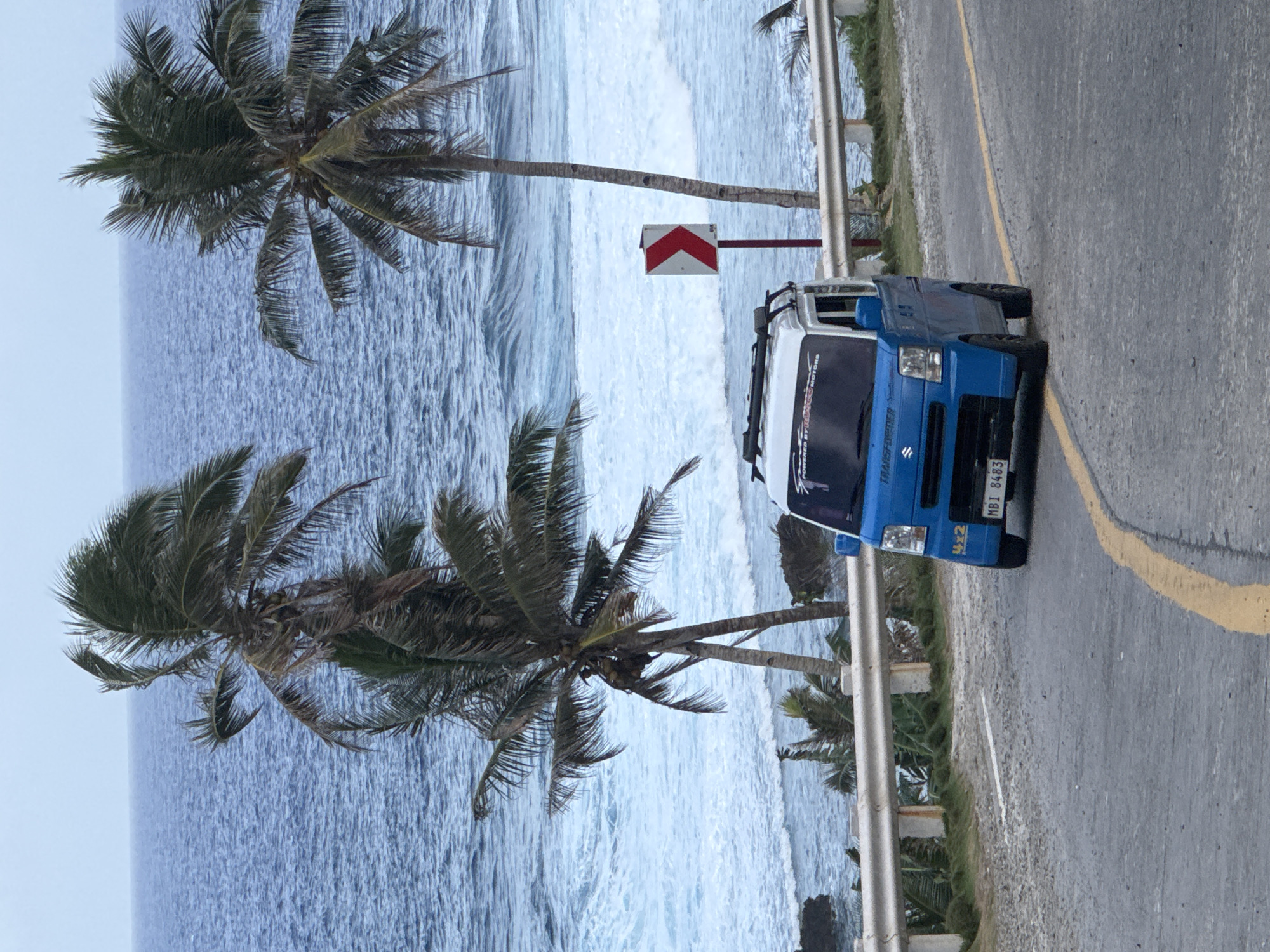 Groups gather along scenic coastal road in Burgos, Philippines