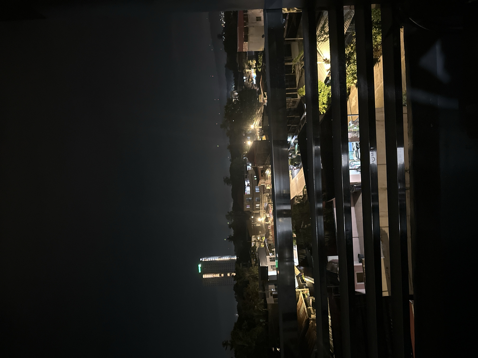 Nighttime rooftop views across Davao City's residential sprawl