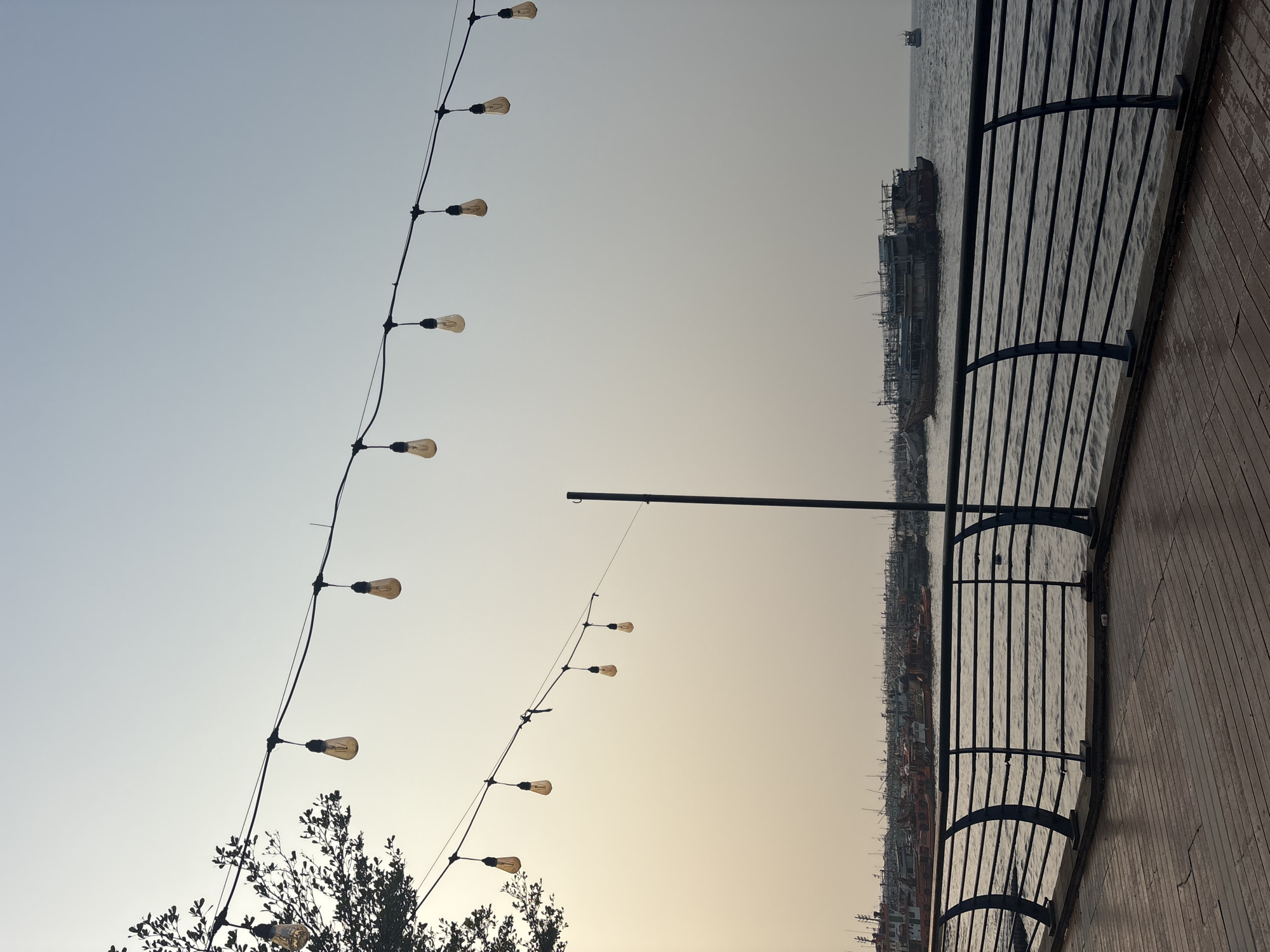 Ancol Baywalk waterfront: harbor life, jet ski crane lift, street scenes
