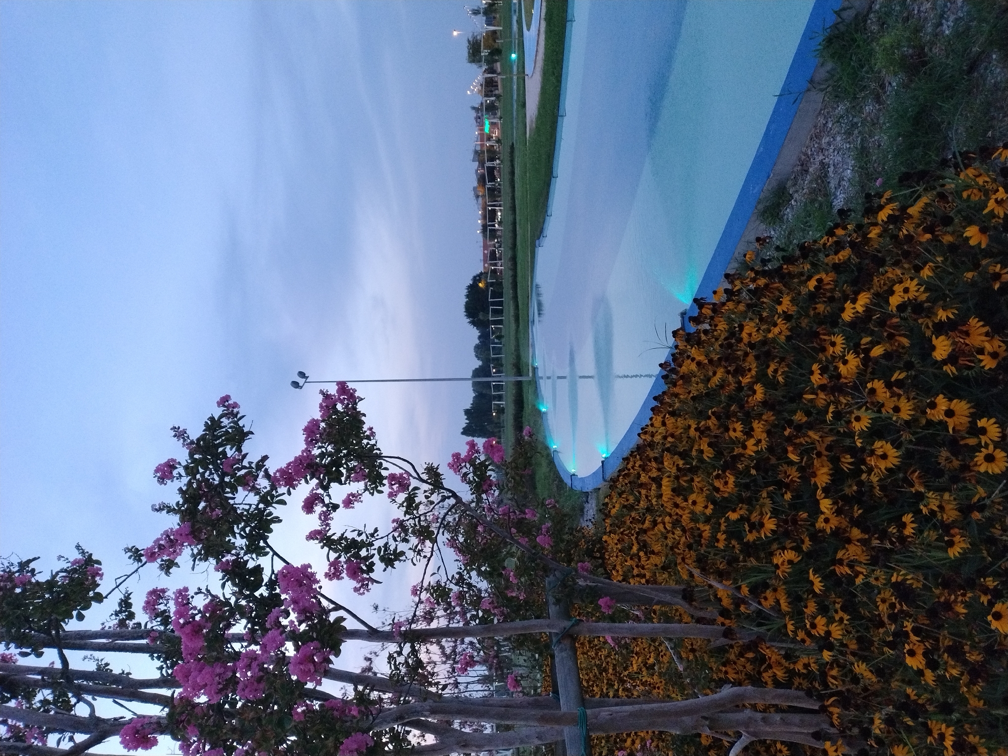 Dusk at a Caorle park and its modern church