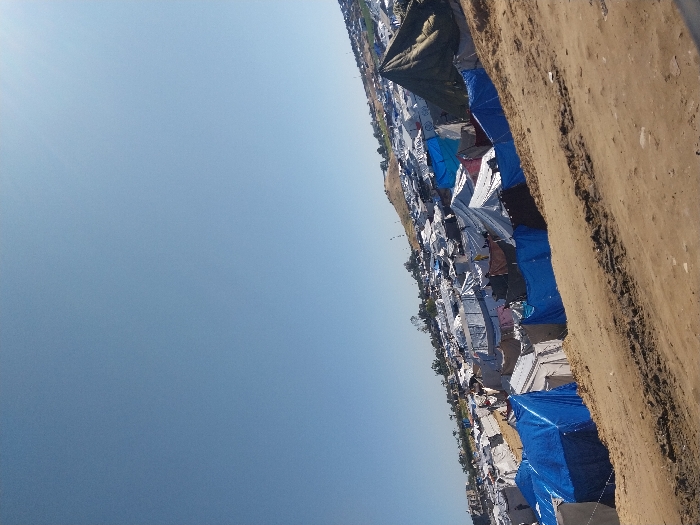 Daily life documented across Gaza displacement camps, damaged areas