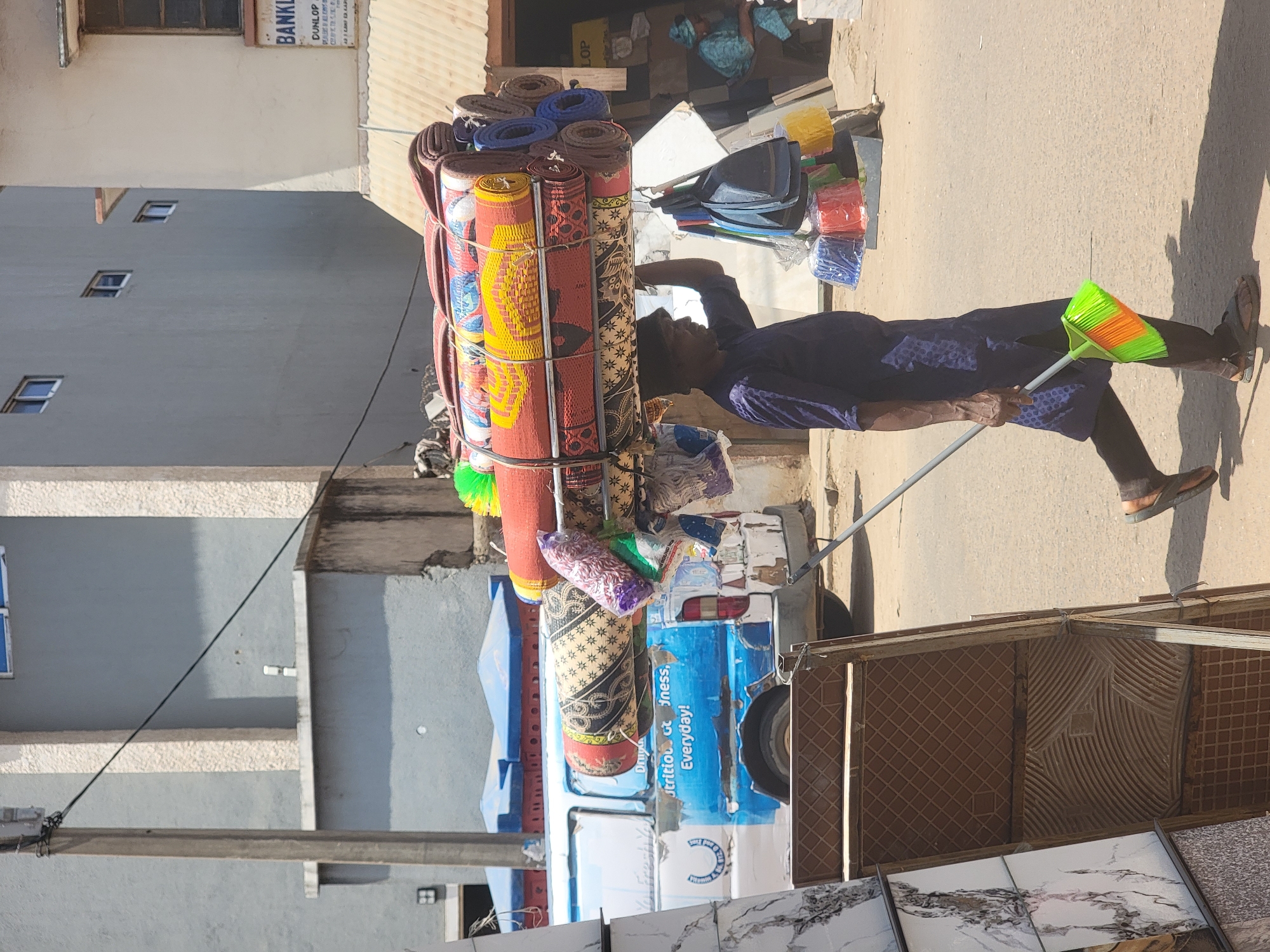 Commercial deliveries and street vendors active in Maiburiji, Nigeria