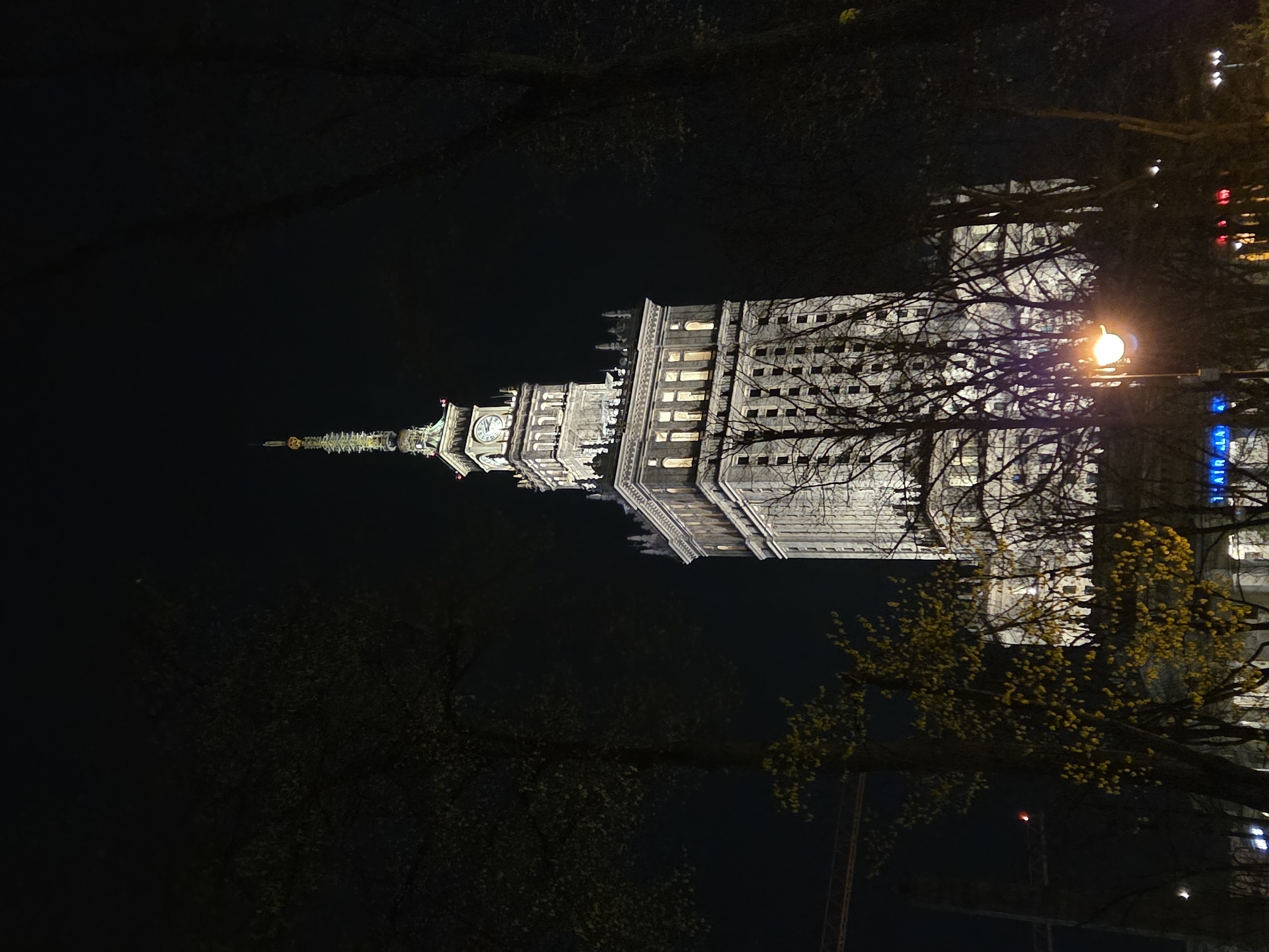 Nighttime scenes captured around Warsaw's Palace of Culture