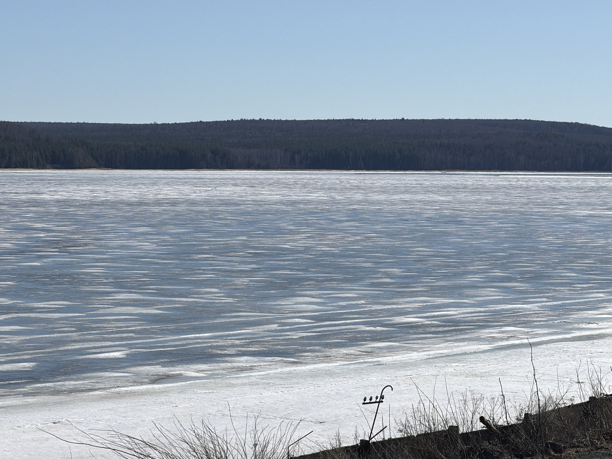 Spring ice breakup observed on Chaikovsky reservoir