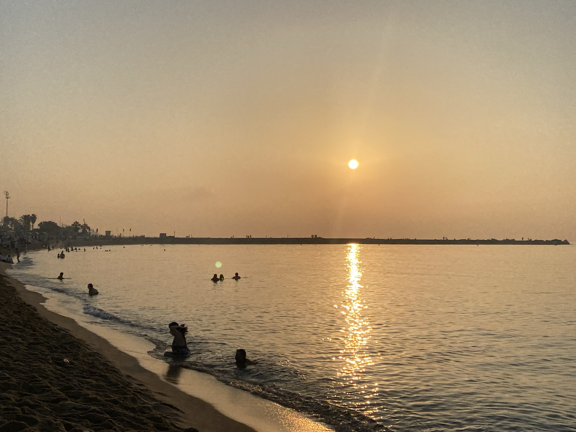 Post-Sant Joan sunset at Barceloneta, beach life still going