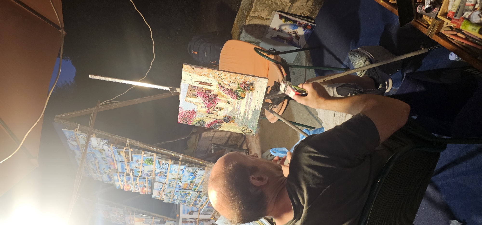 Nighttime plein air painting under lamplight in Supetar, Croatia.