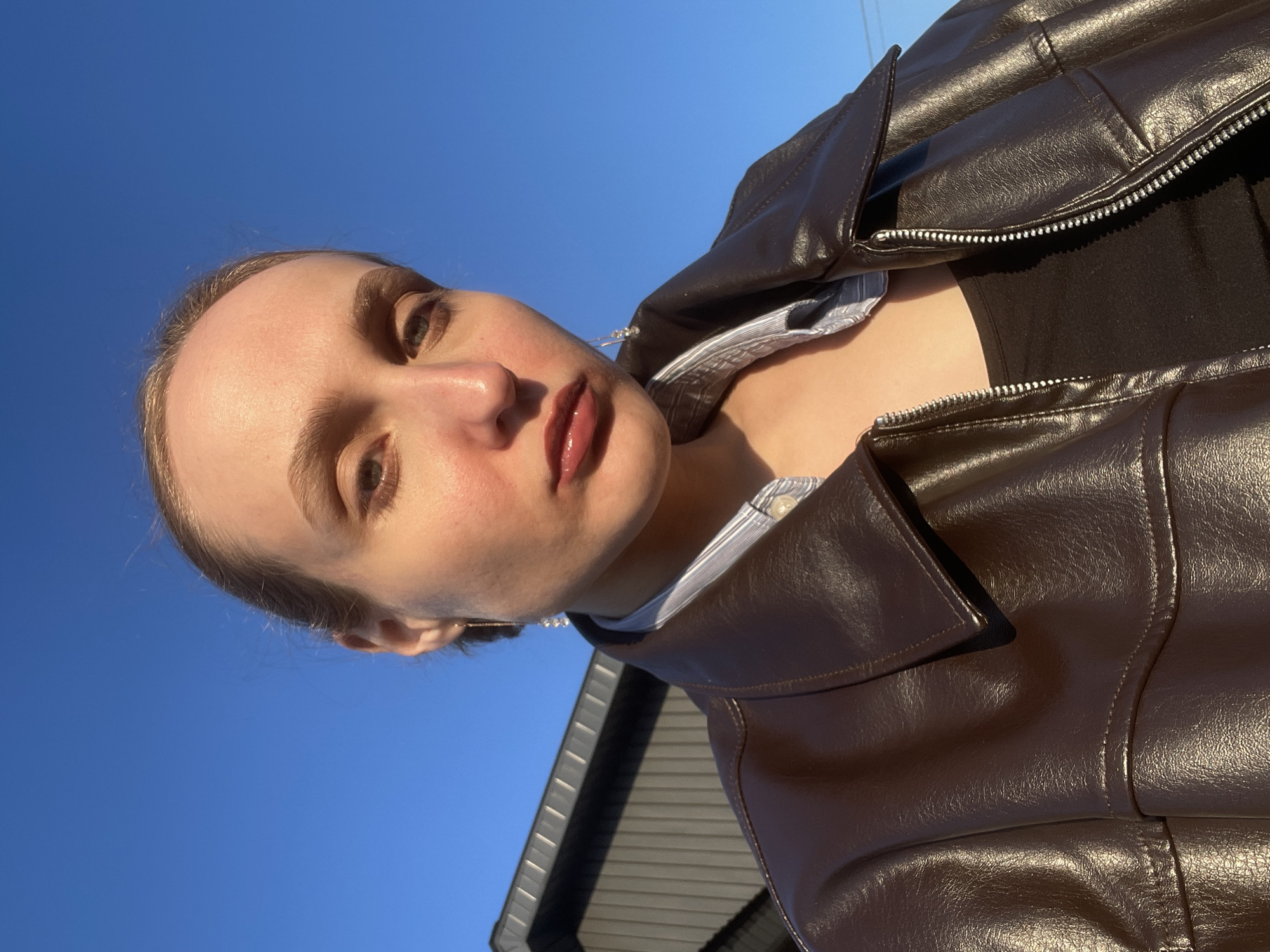 Young woman photographs self in Russian countryside portraits