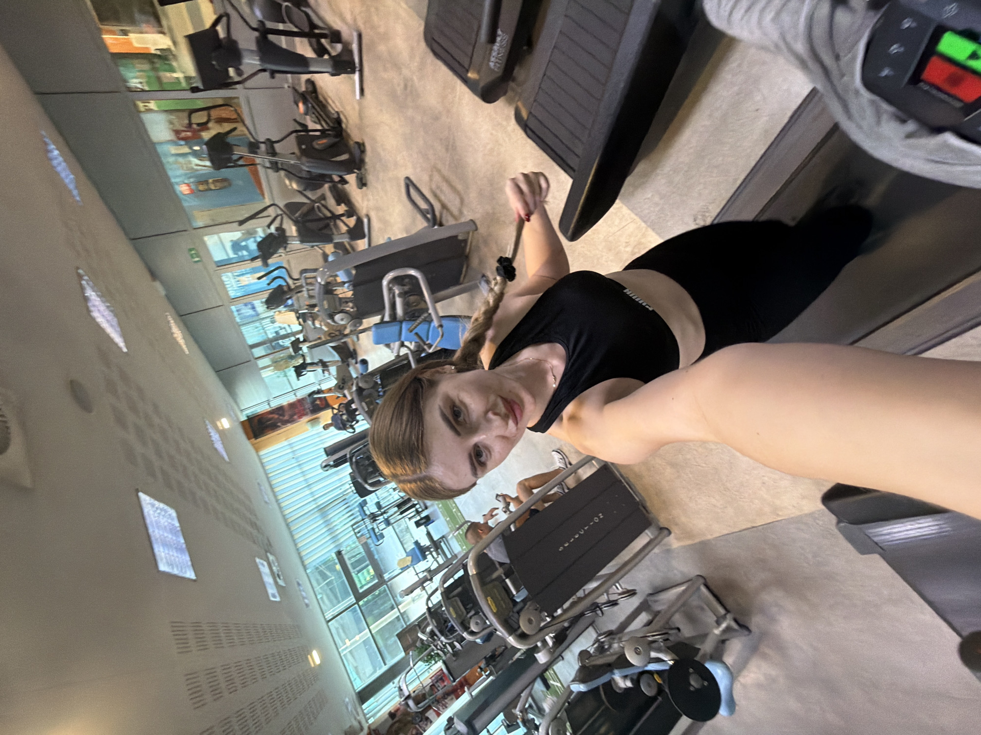 Gym workout session: treadmill, selfies, and equipment use