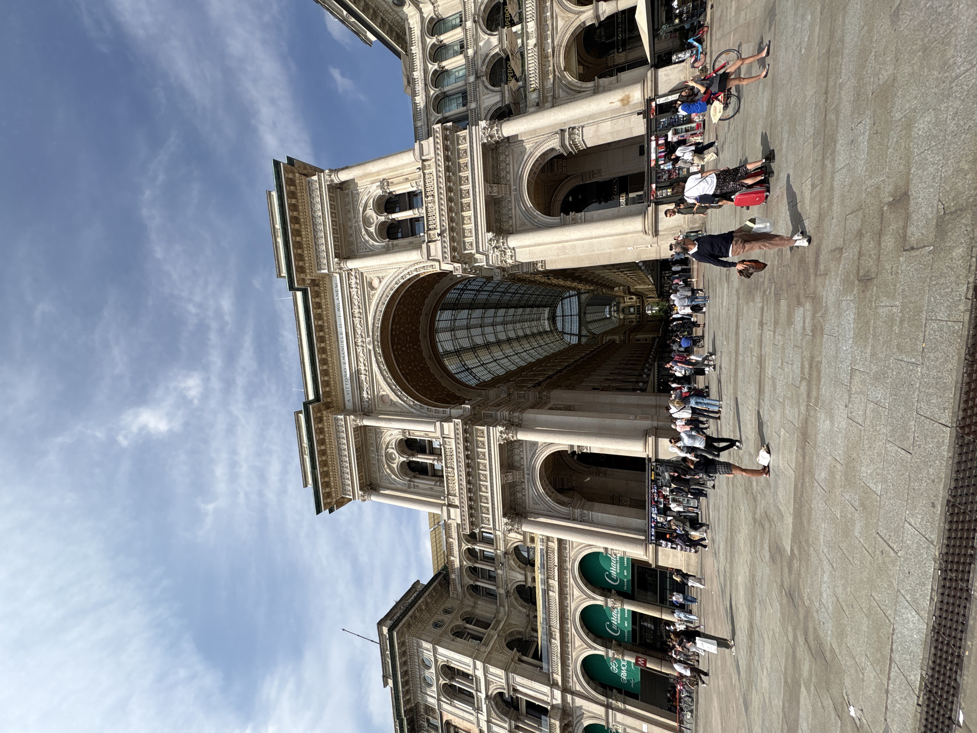 Sunny afternoon scenes captured at Milan's historic cathedral district