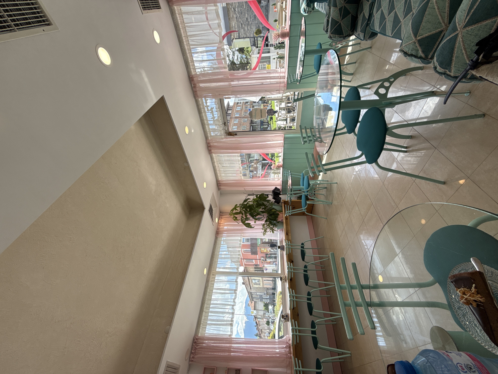 Modern pastel cafe interior documented in Razlog, Bulgaria
