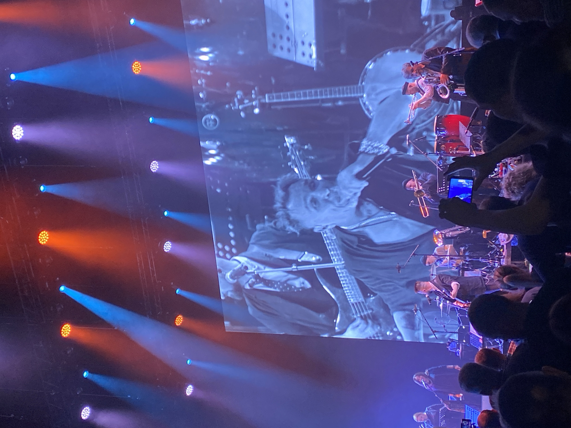 Rock band performs concert in Yekaterinburg with stage lighting