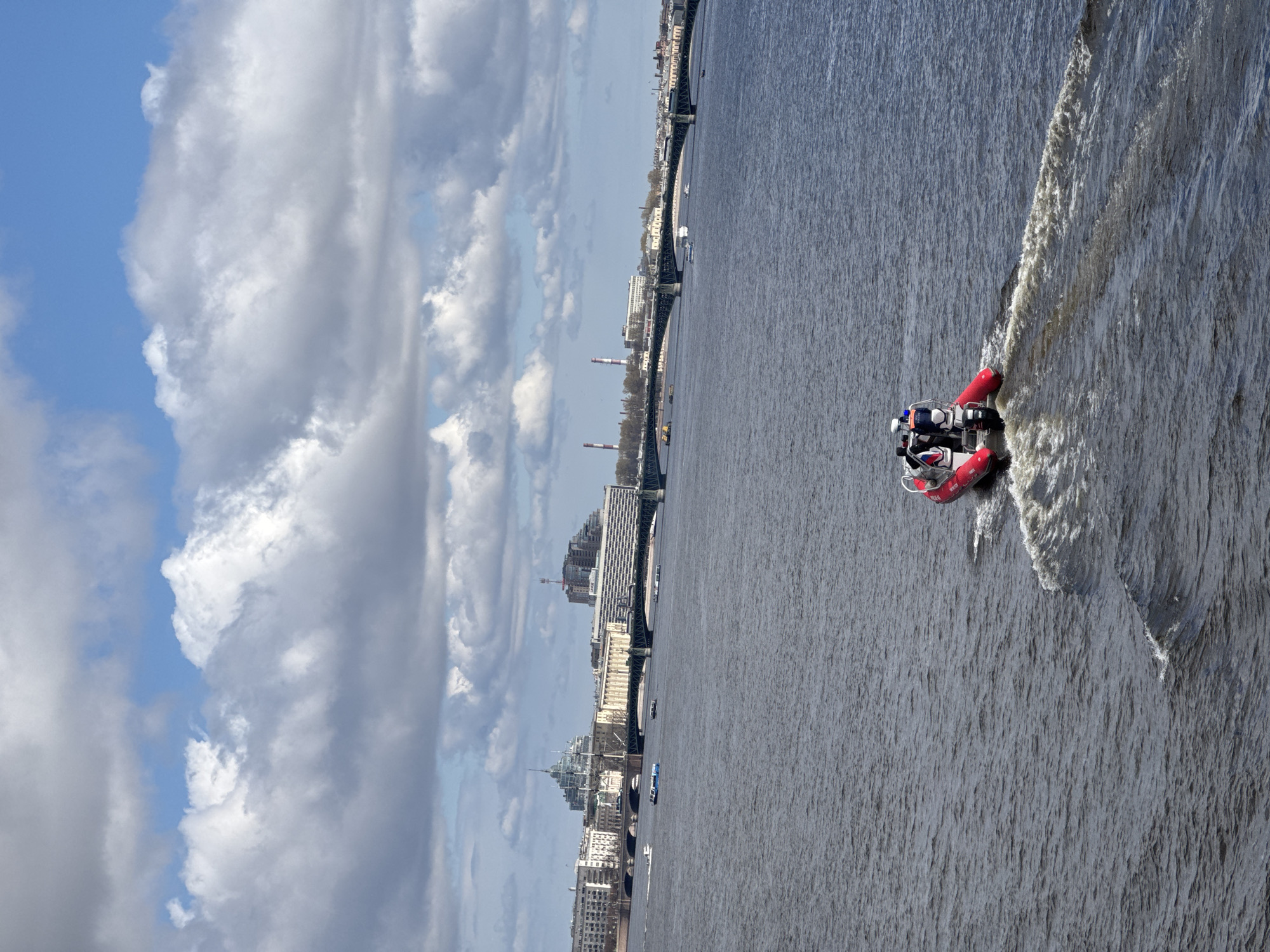 Red inflatable boat spotted on Saint Petersburg waterway
