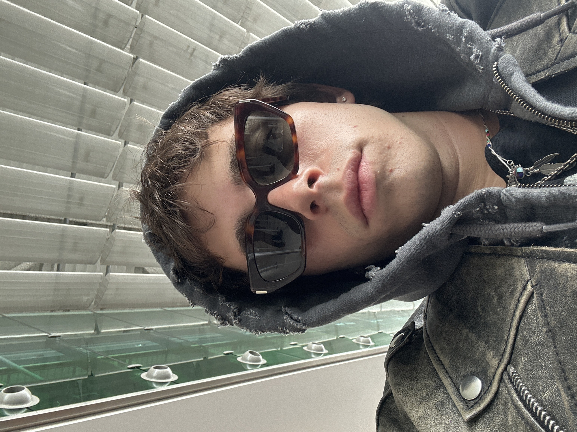 Person takes indoor selfies in Le Mesnil-Amelot, France