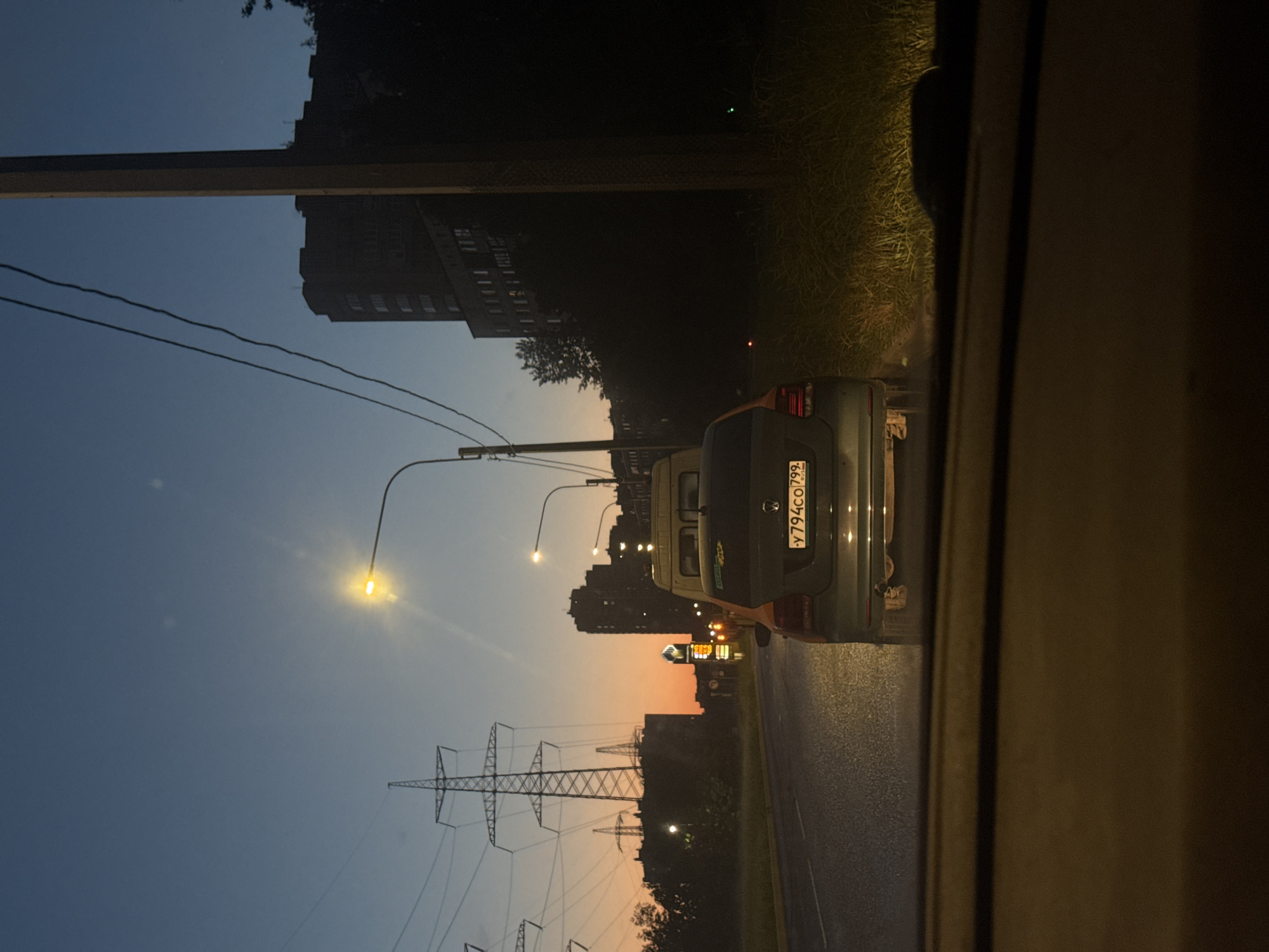 Evening drive through Saint Petersburg, dashboard and city in frame