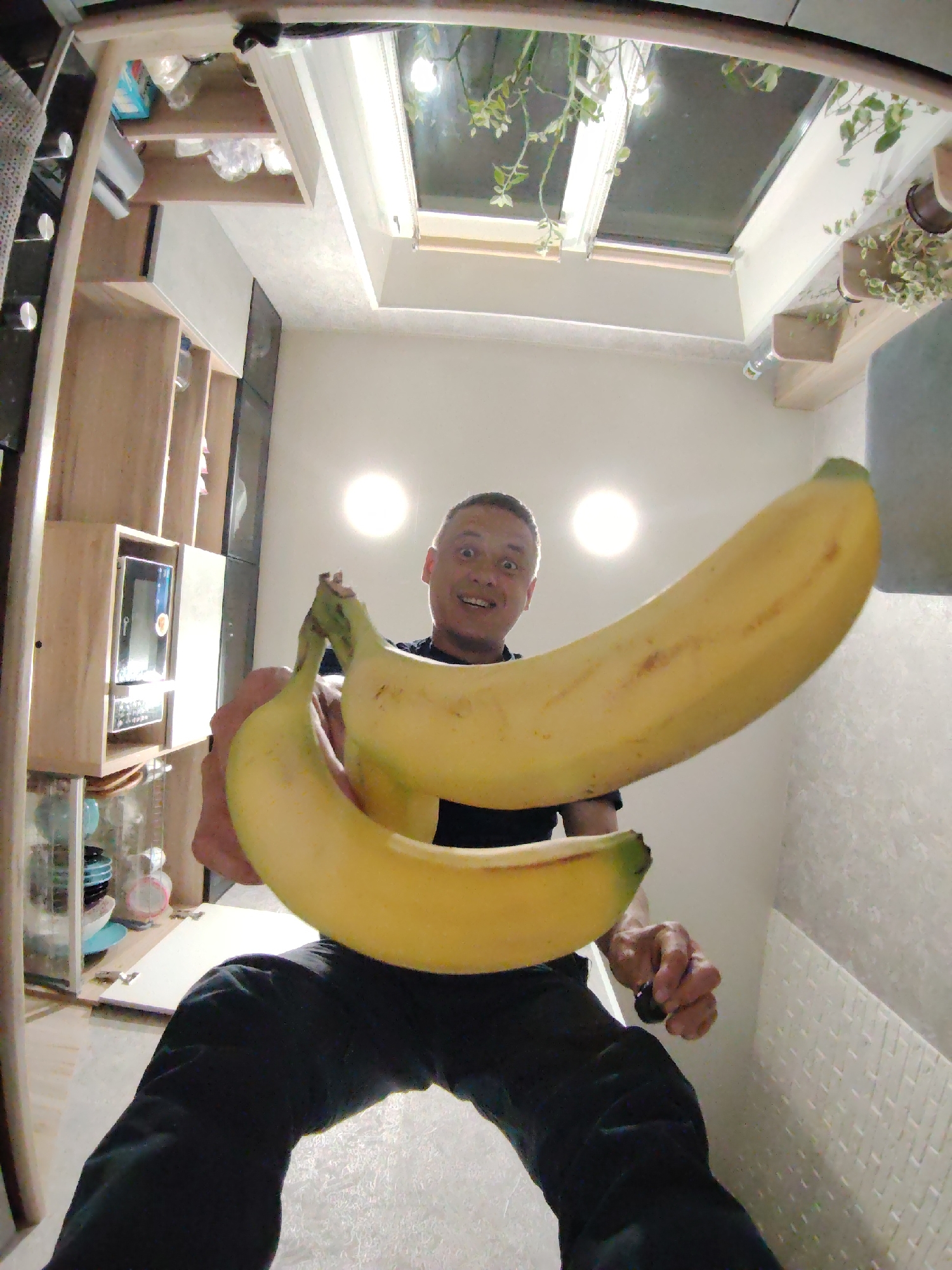 Man's Playful Evening Moments Captured in Russian Household