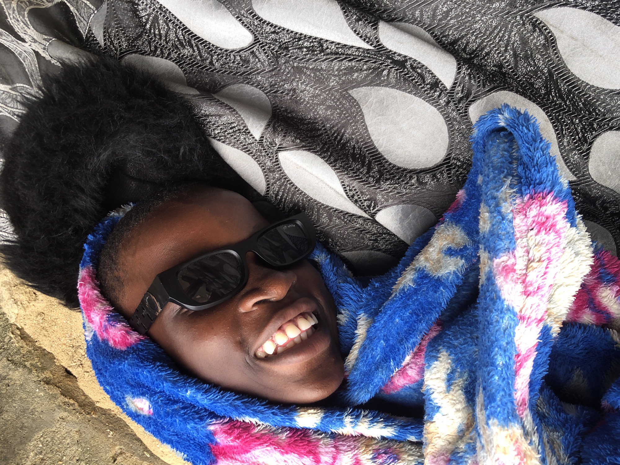 Styled blanket-and-sunglasses shoot on a motorcycle in Ado, Nigeria