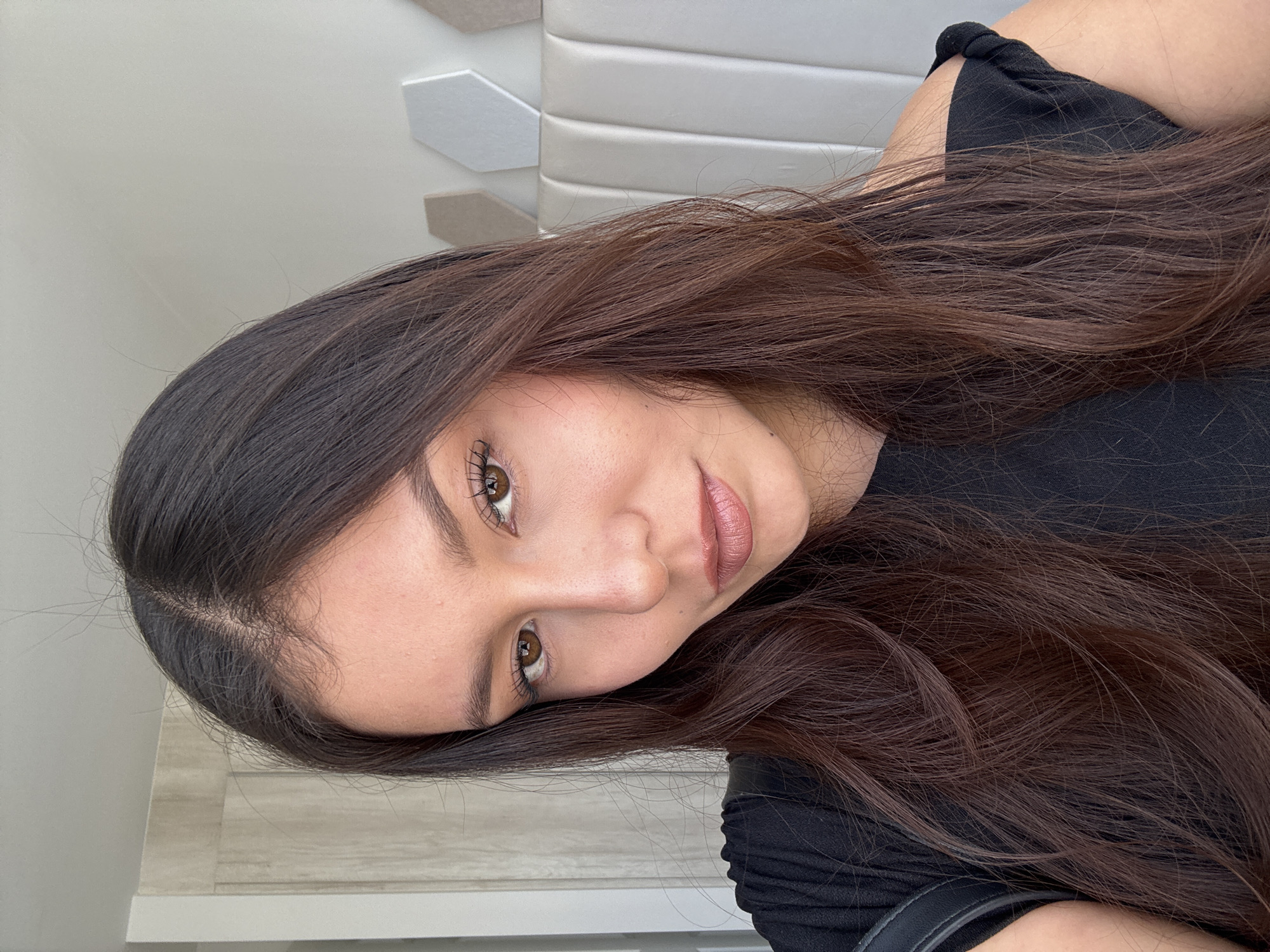 Woman takes selfies indoors in San Francisco Ocotlán