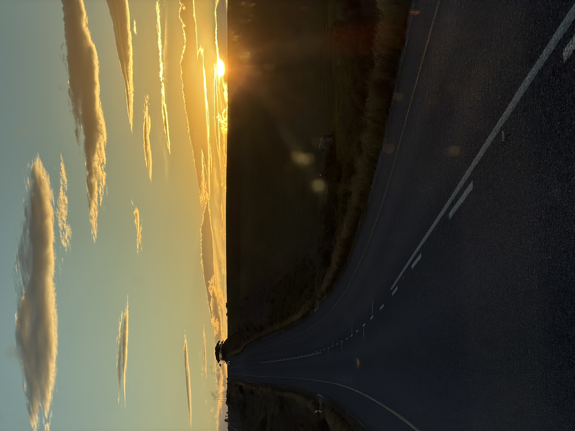 Golden hour sunset documented on South African coastal road