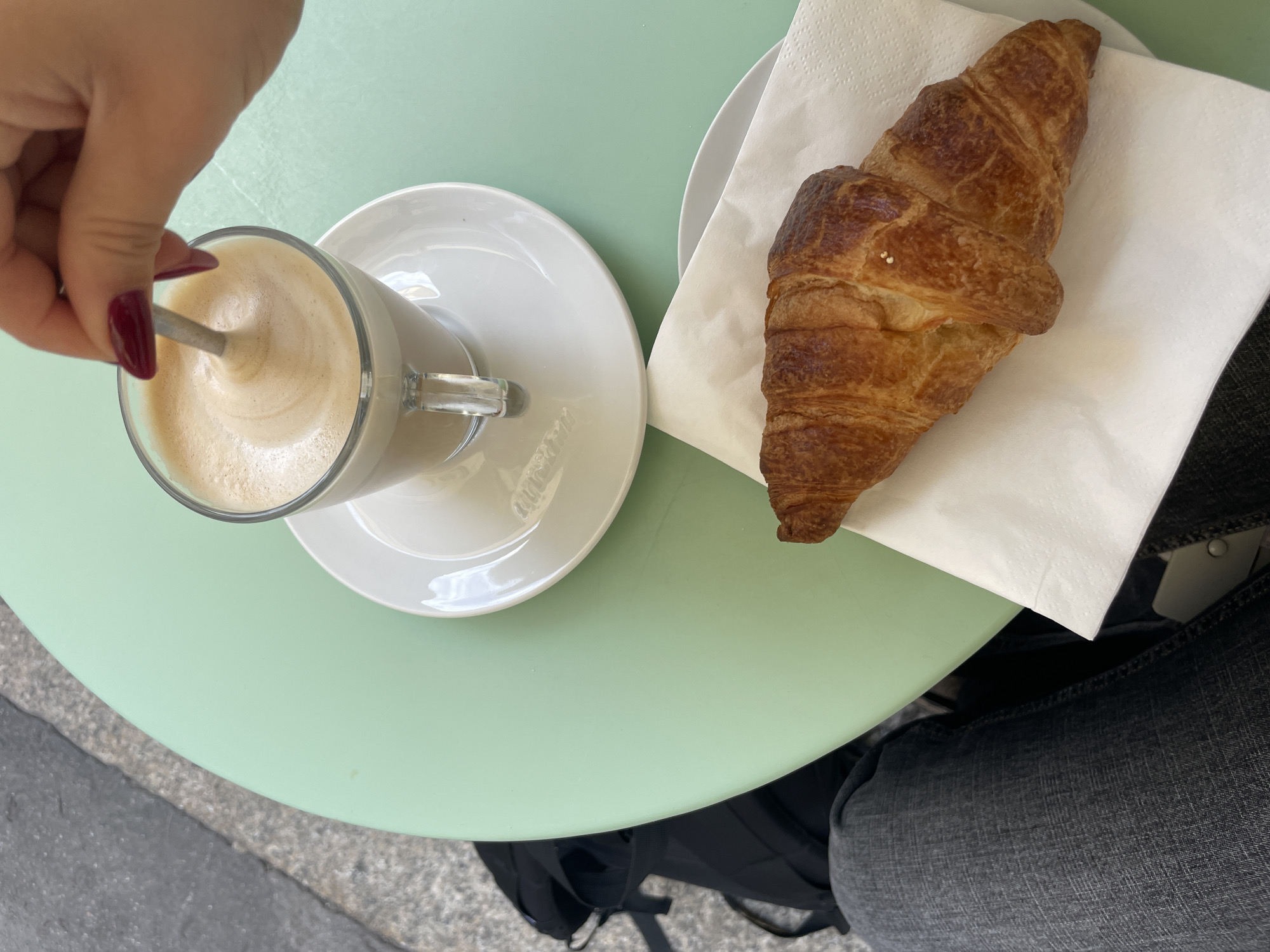 Morning scenes captured in Milan: breakfast table, office space