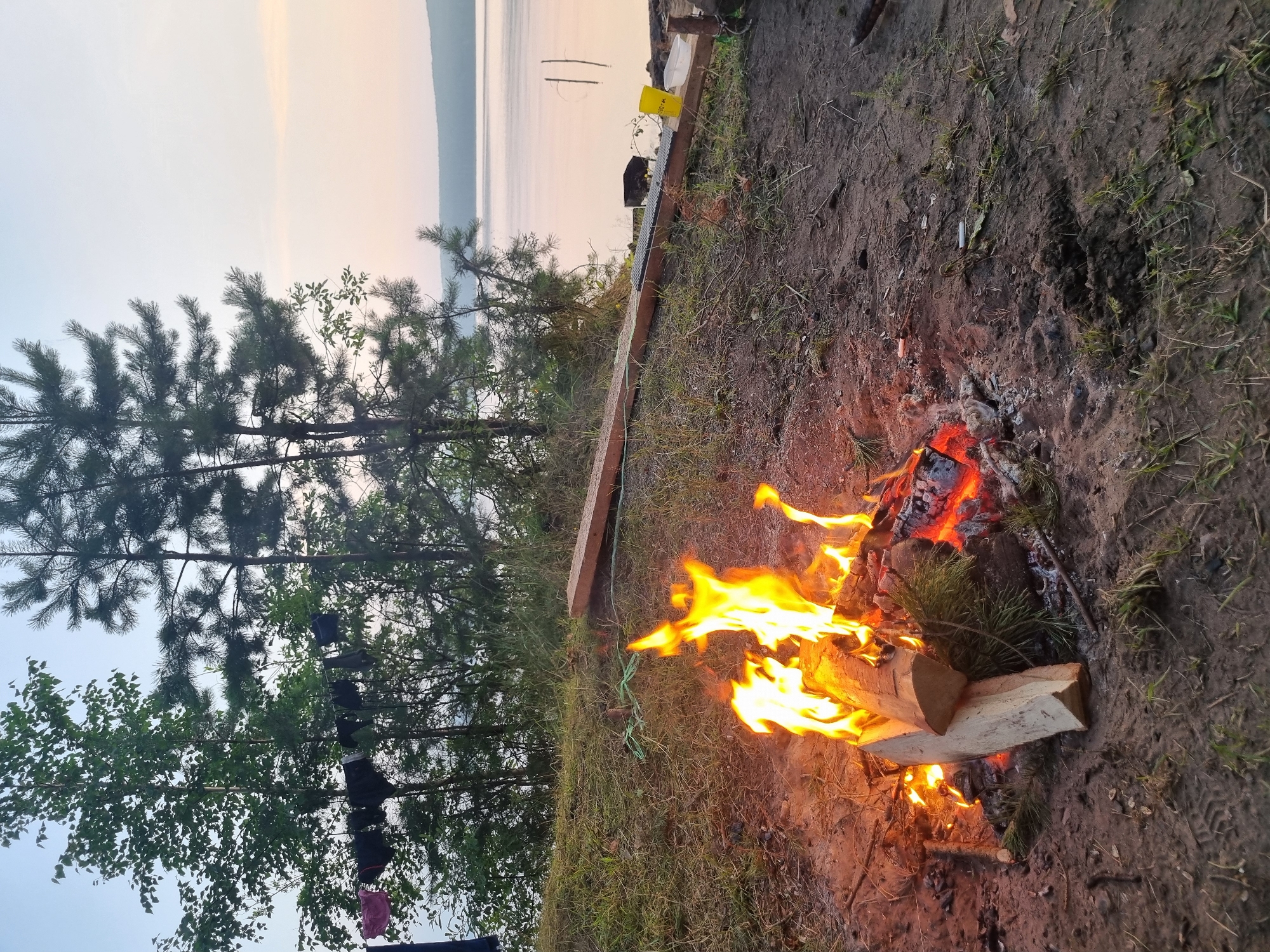 Campfire on the Kama River shore at dusk, Chaykovsky