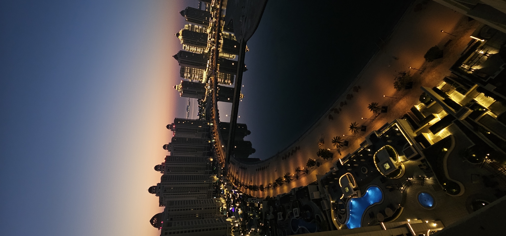 Aerial dusk views over The Pearl-Qatar, Doha