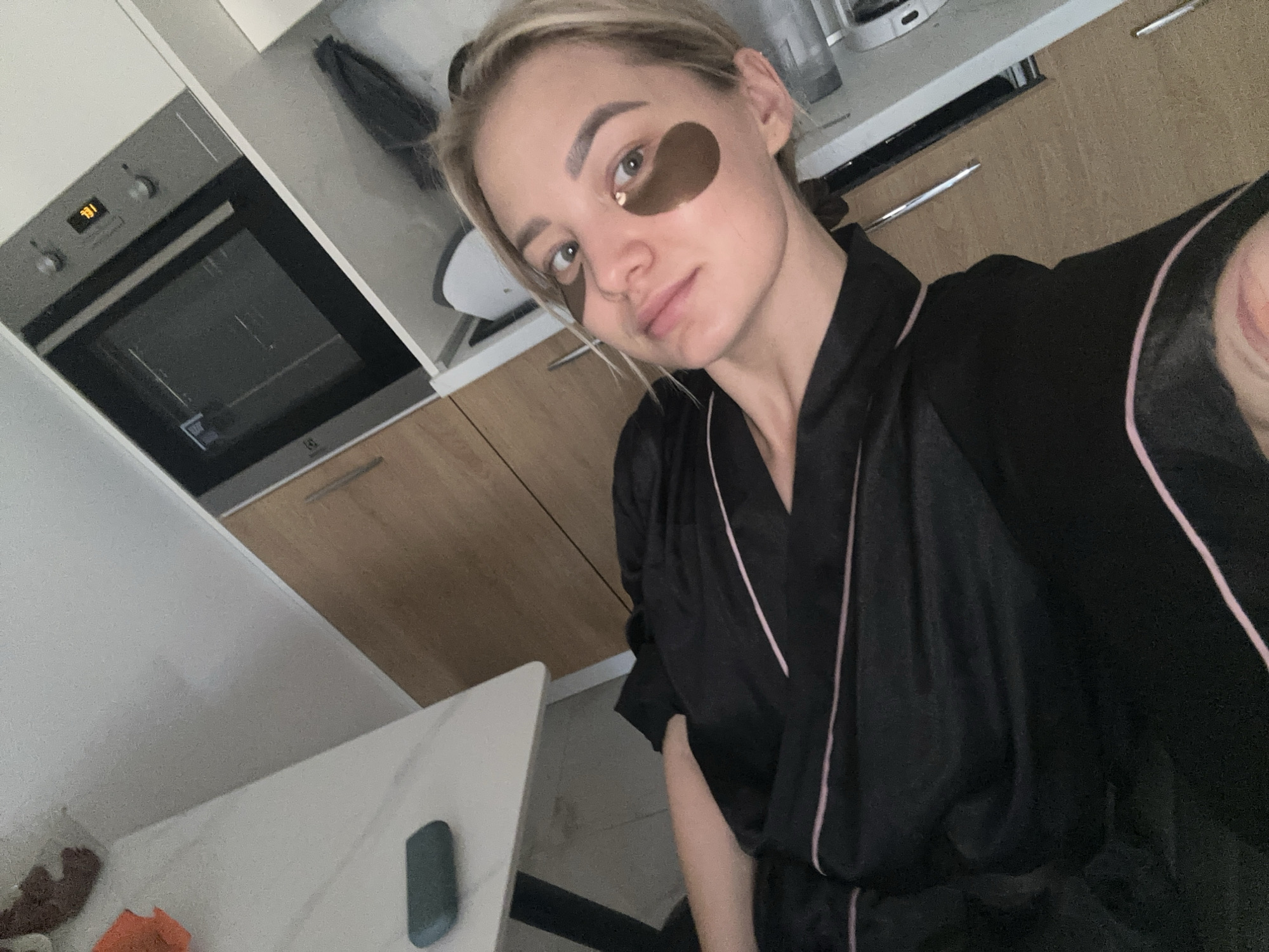 Woman documents early morning self-care routine in Budva kitchen