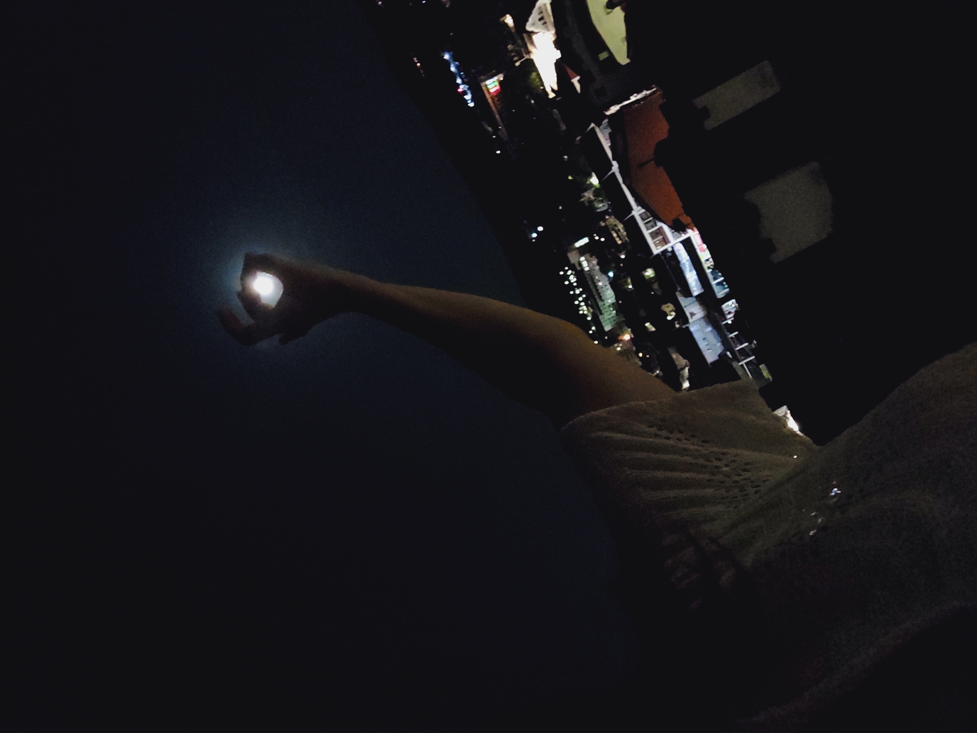 Full moon night over Veliko Tarnovo, hand reaching for the sky