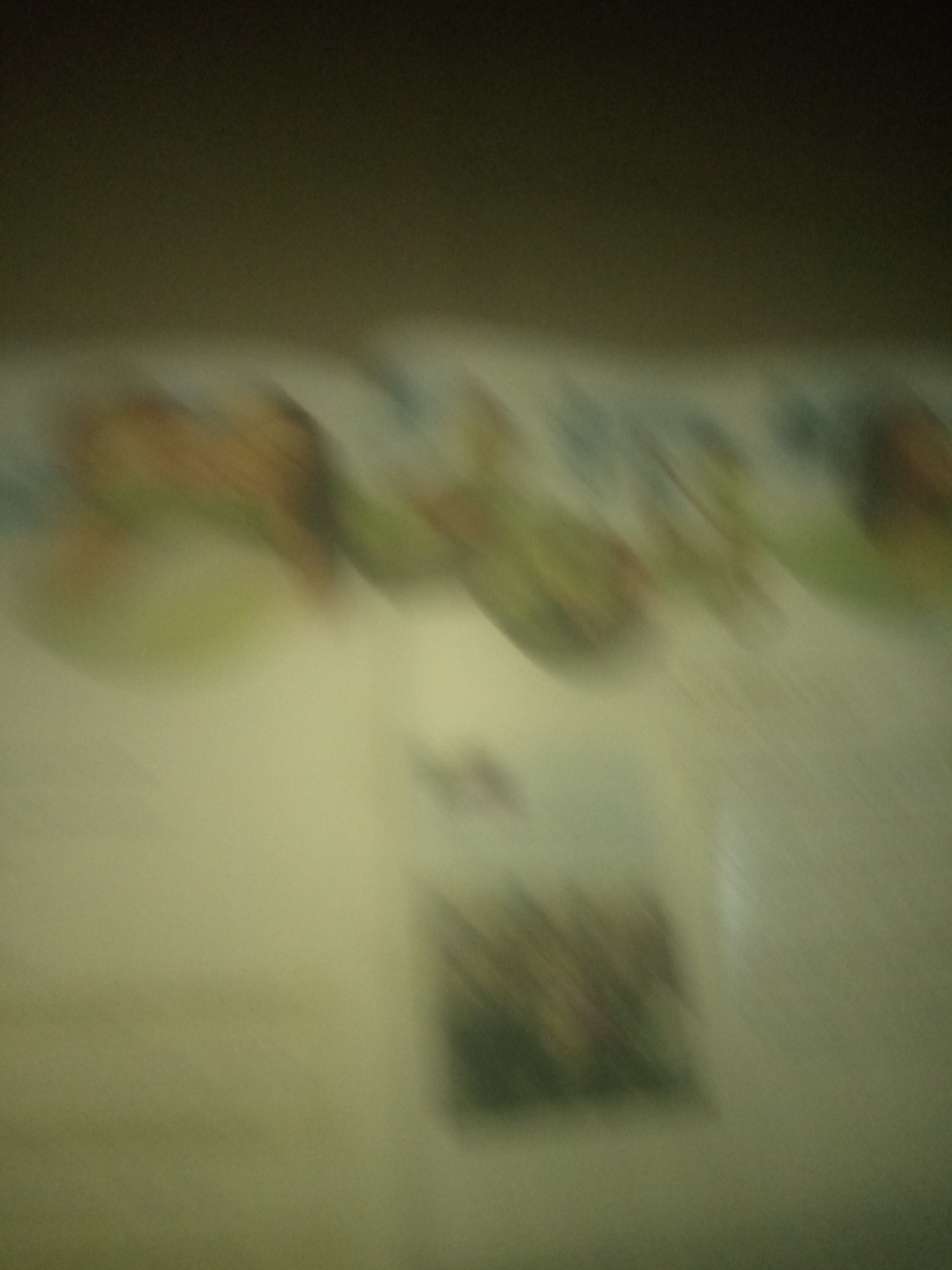 Nigerian primary school textbooks flipped through in an evening session