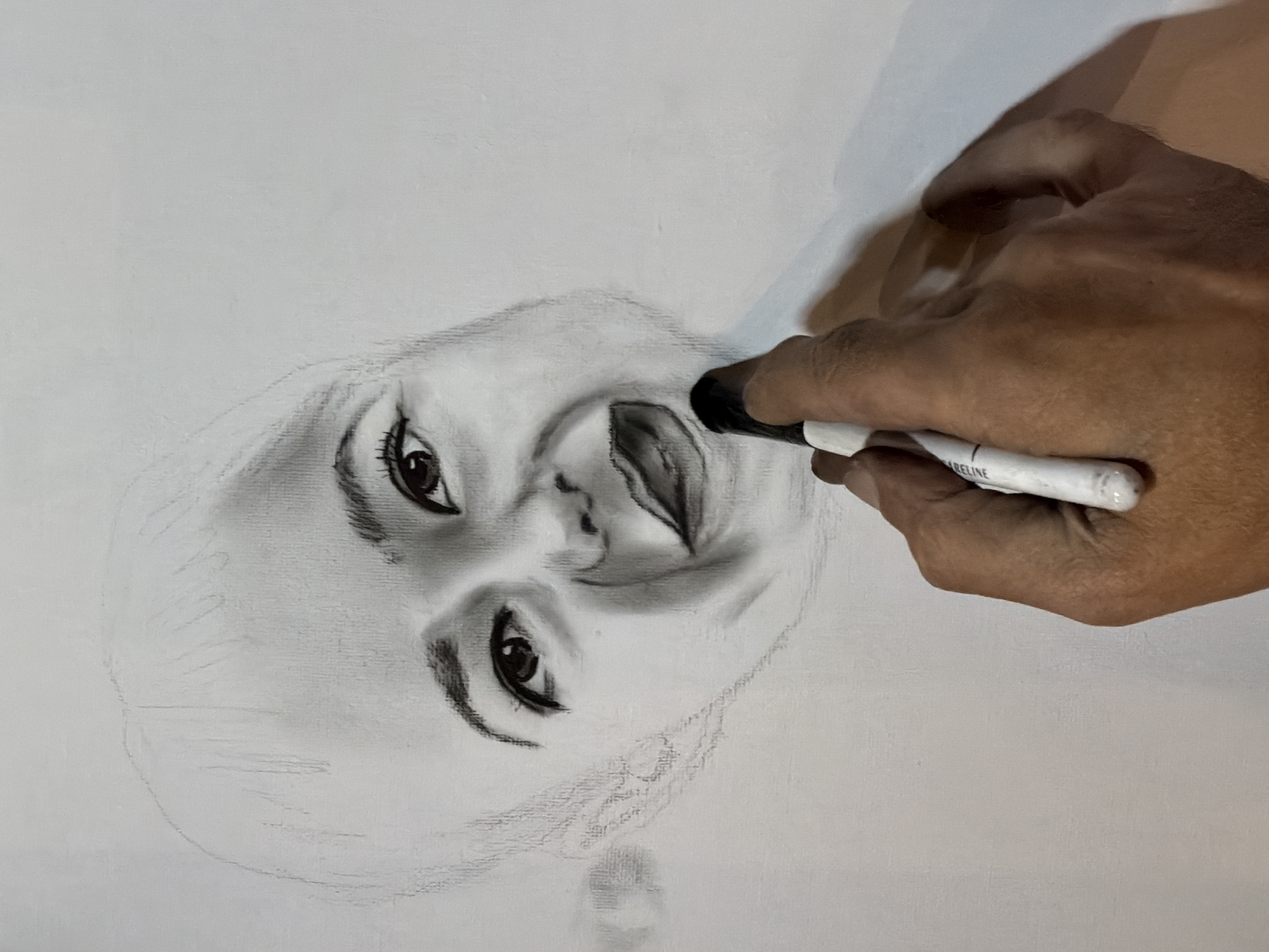 Artist draws portrait sketch in Eilat, Israel