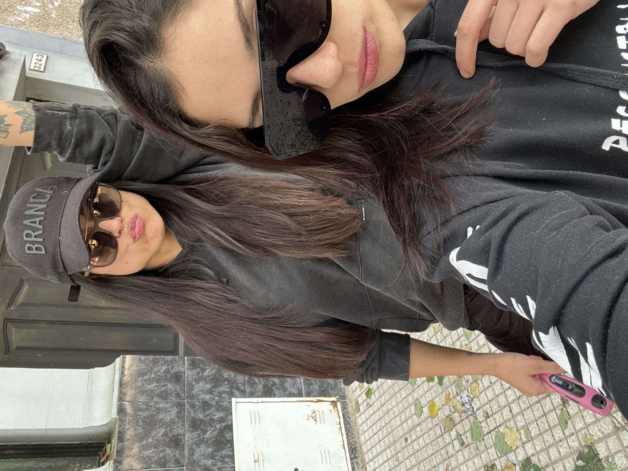Women take selfies, dog walker spotted on Buenos Aires street