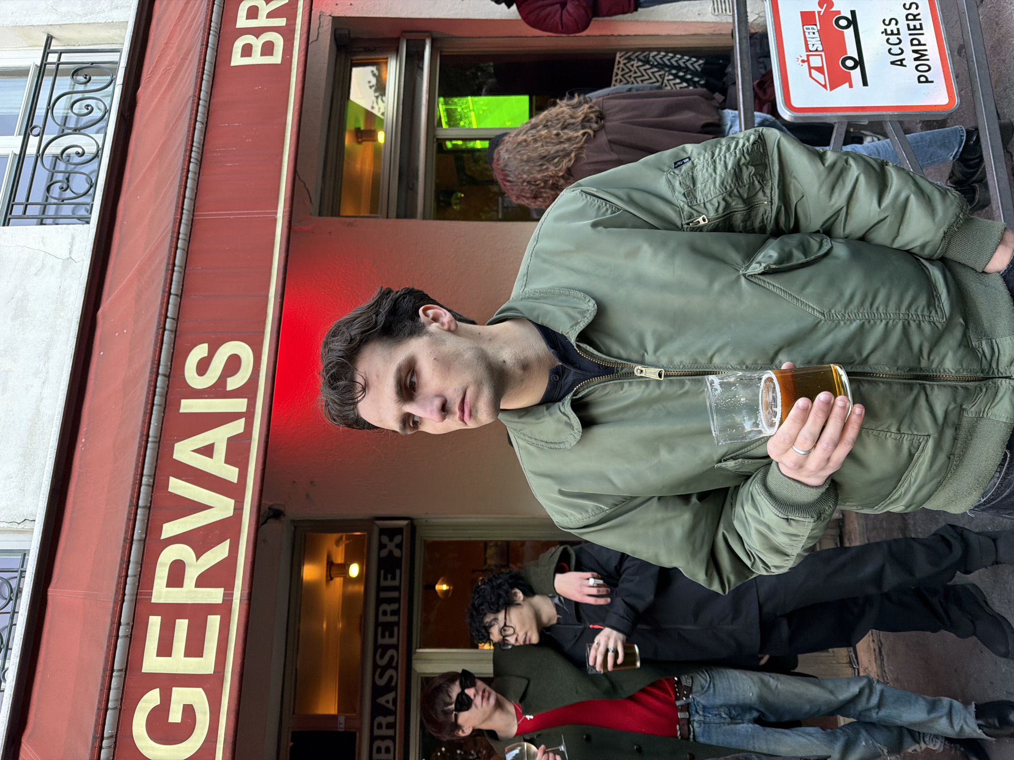 Evening gathering at Paris brasserie draws casual crowd