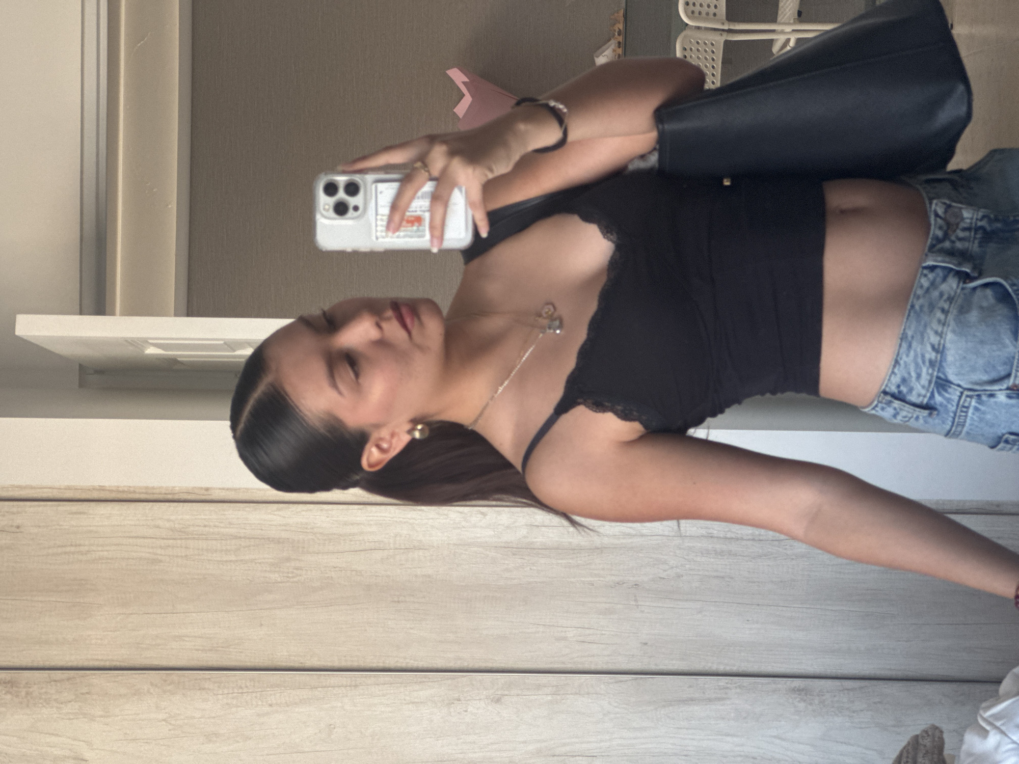 Woman takes mirror selfies in San Francisco Ocotlán, Mexico
