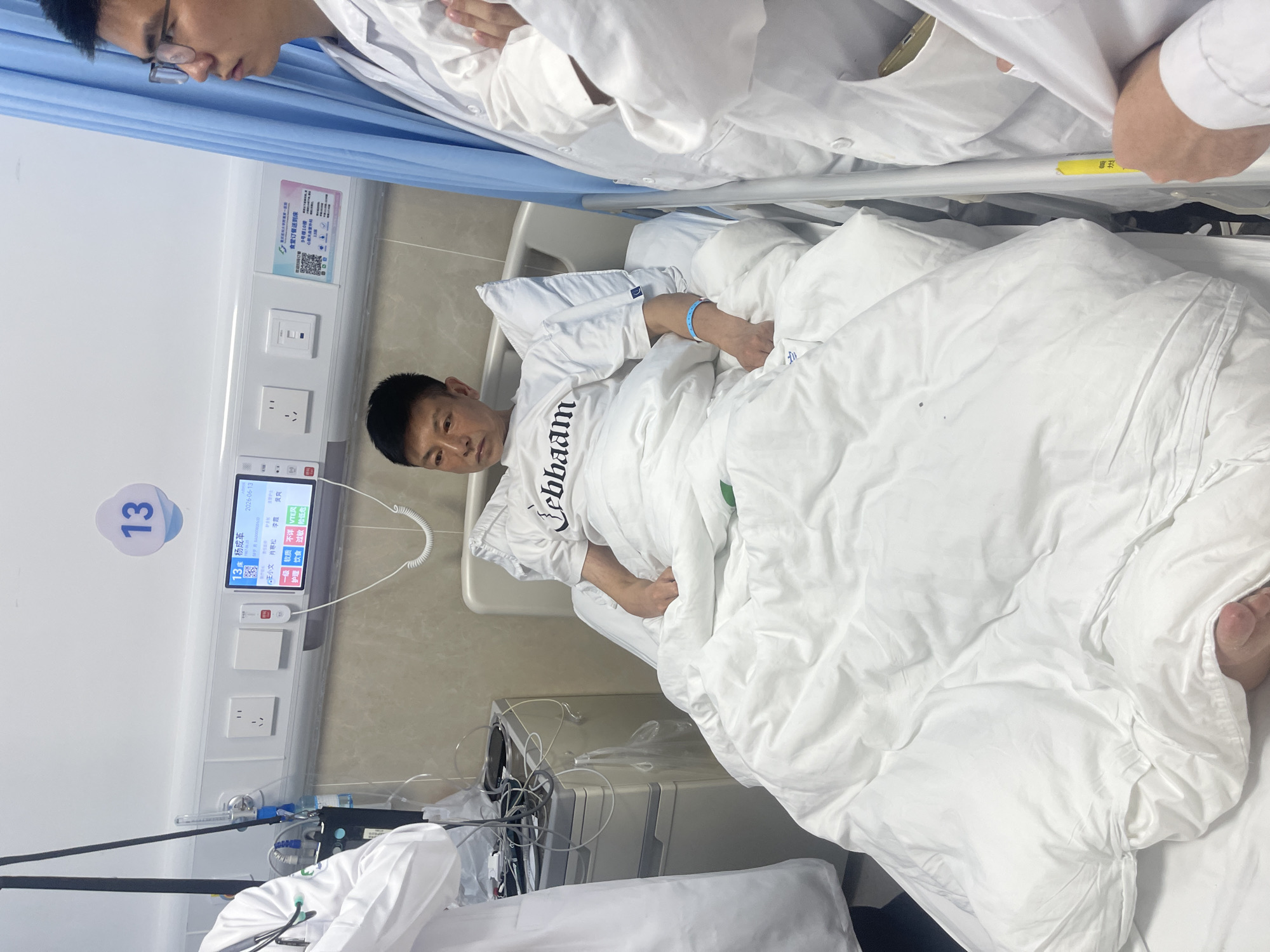 Medical trainees on hospital rounds, Yuzhong District, rainy morning