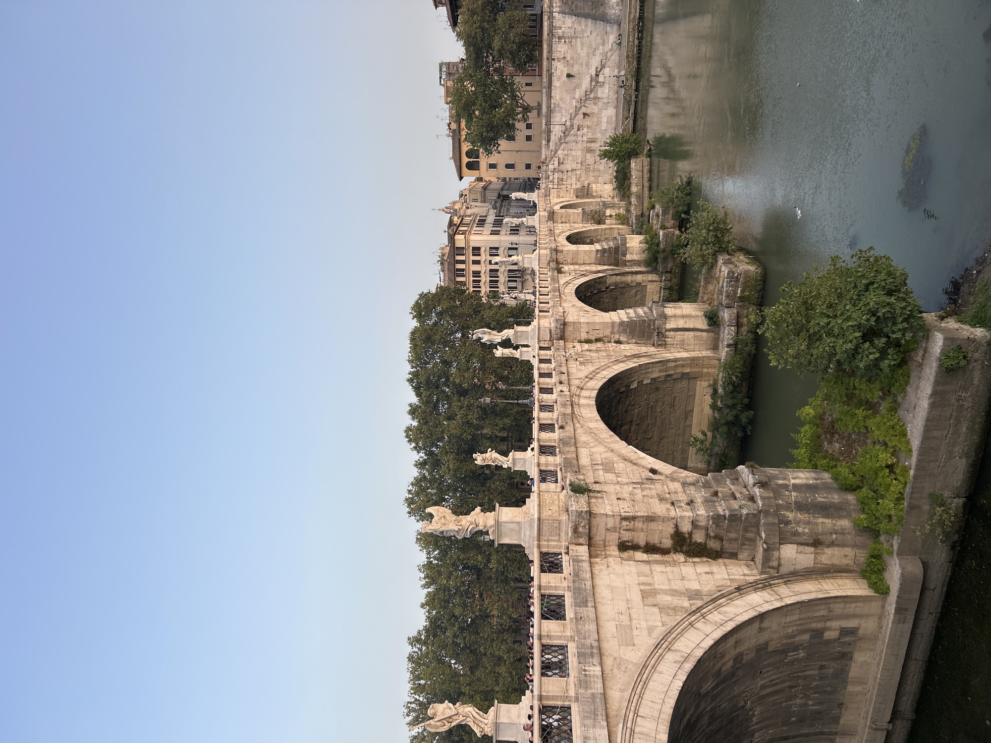 Evening stroll along Ponte Sant'Angelo, Rome