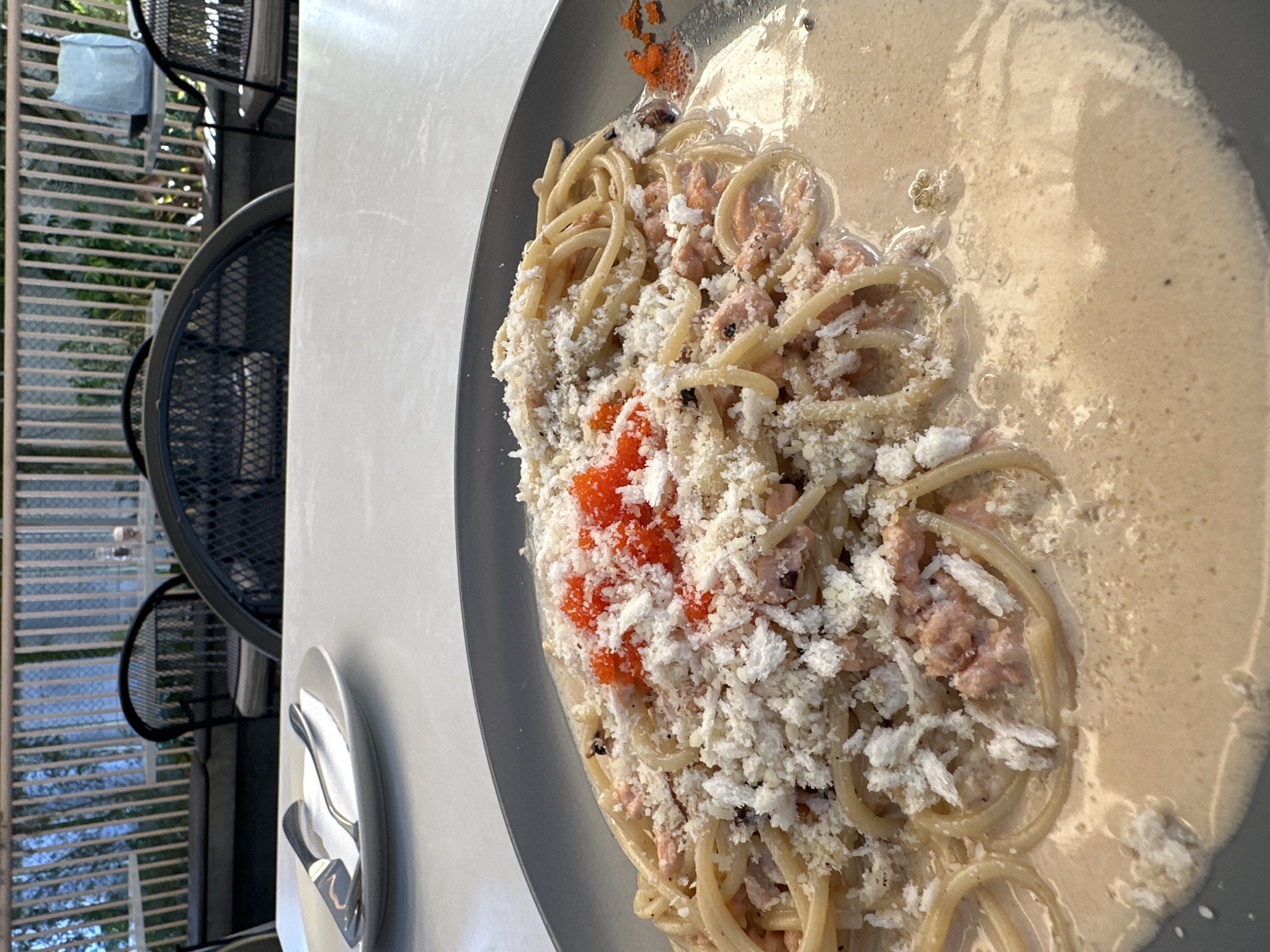 Morning motorcycle ride through tropical city with pasta stop