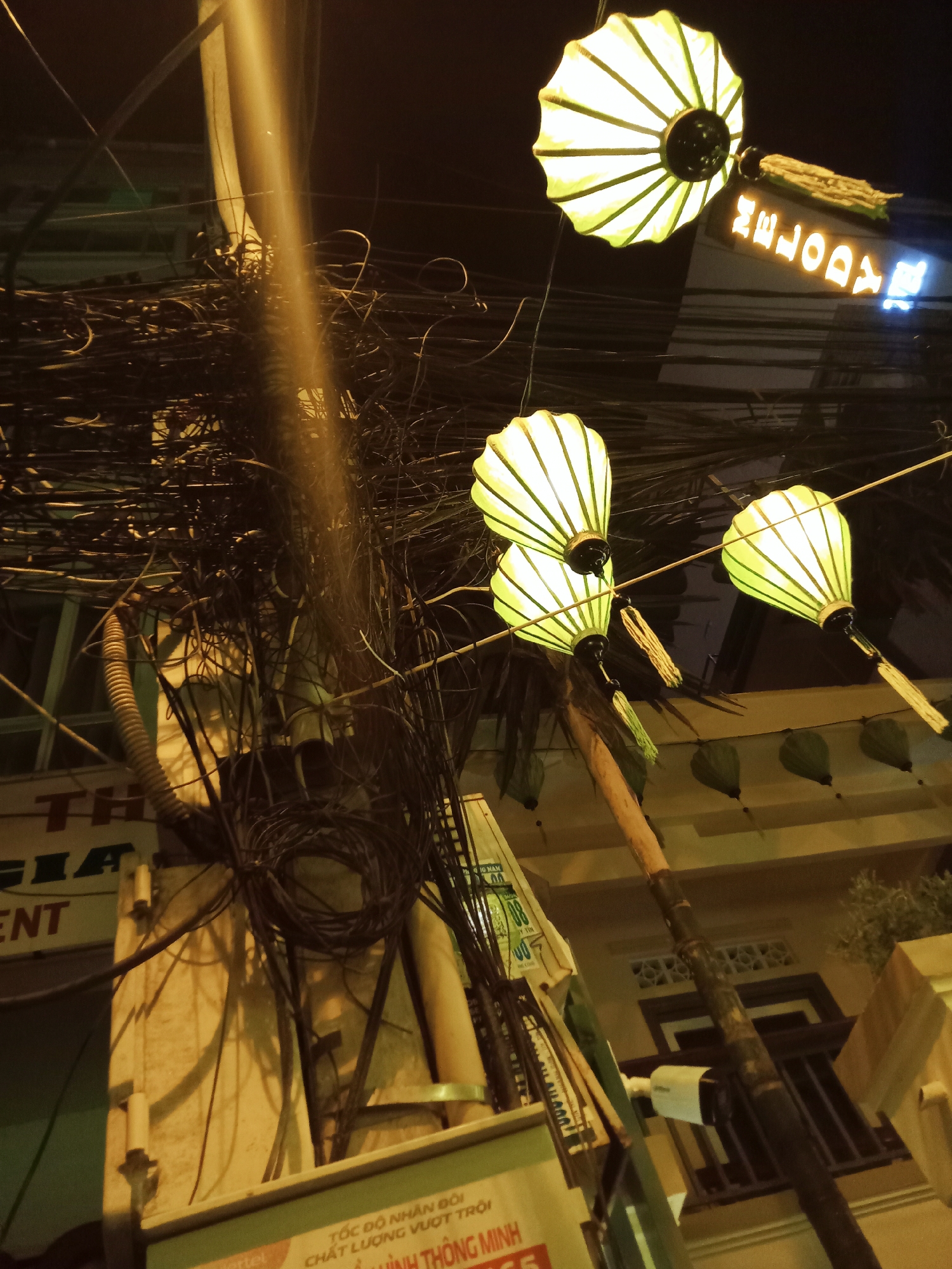 Evening stroll through lantern-lit Nha Trang streets and shops