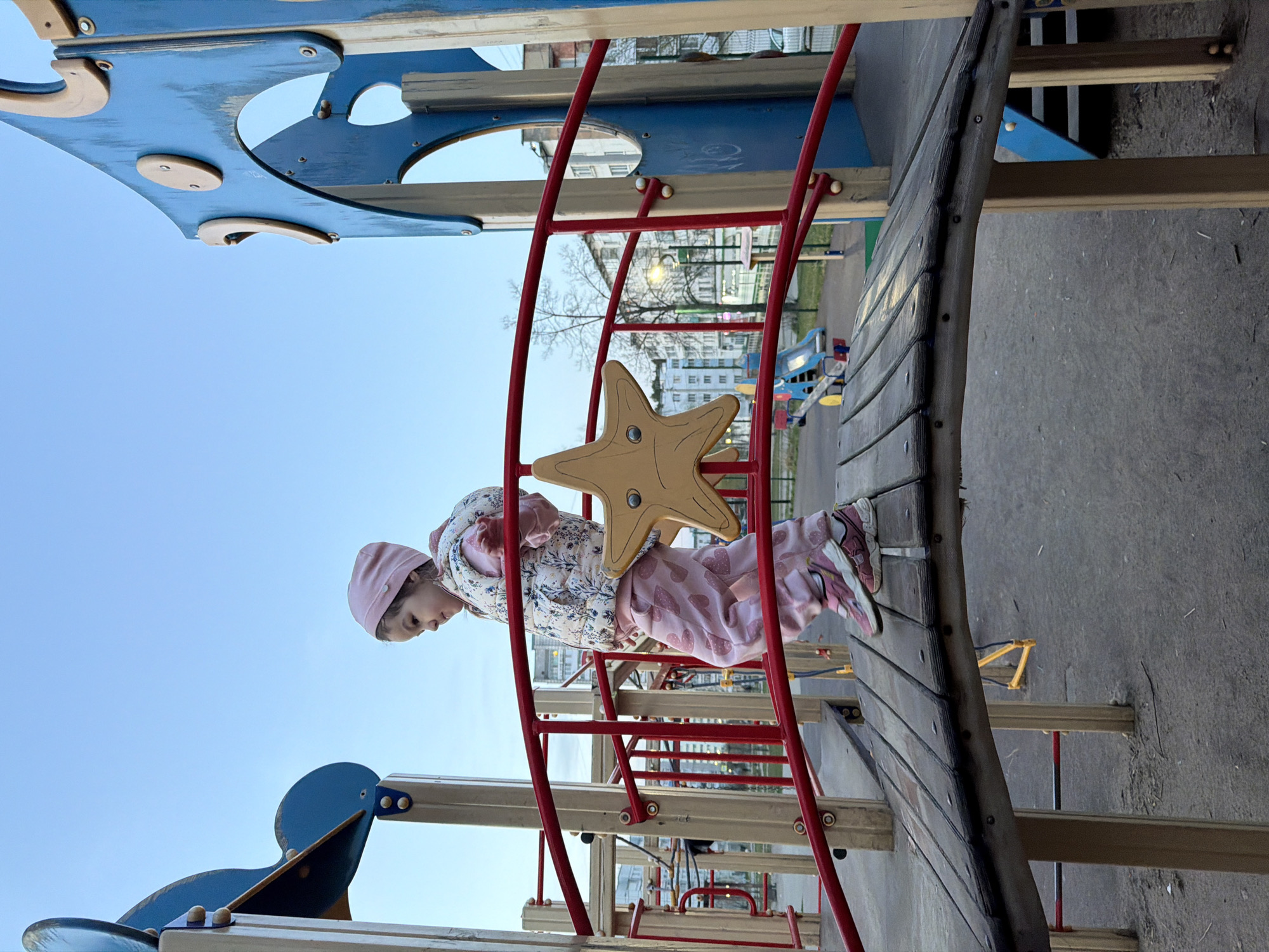 Families enjoy afternoon playground activities in Chaikovsky, Russia