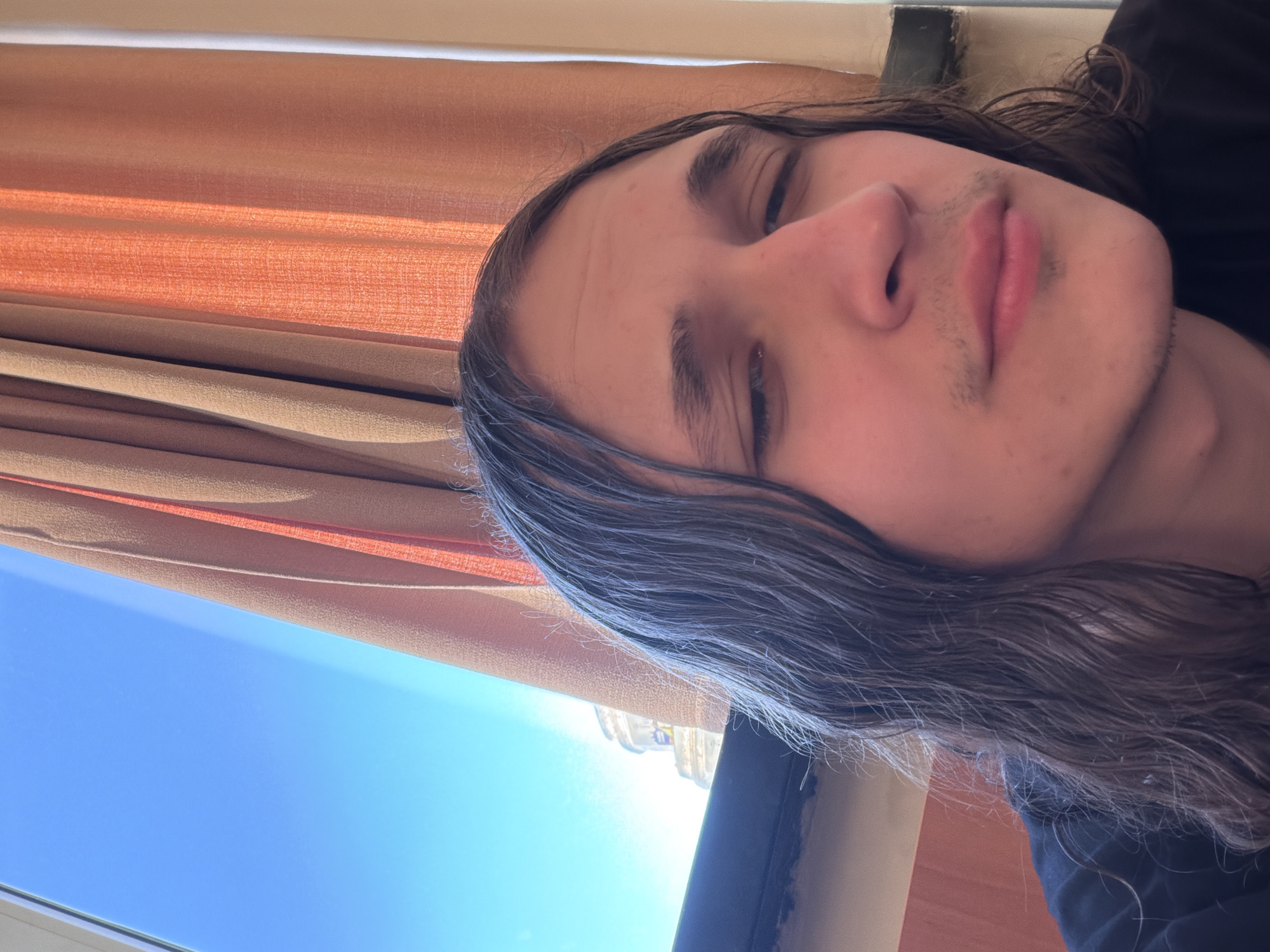 Person takes multiple selfies in Plovdiv apartment