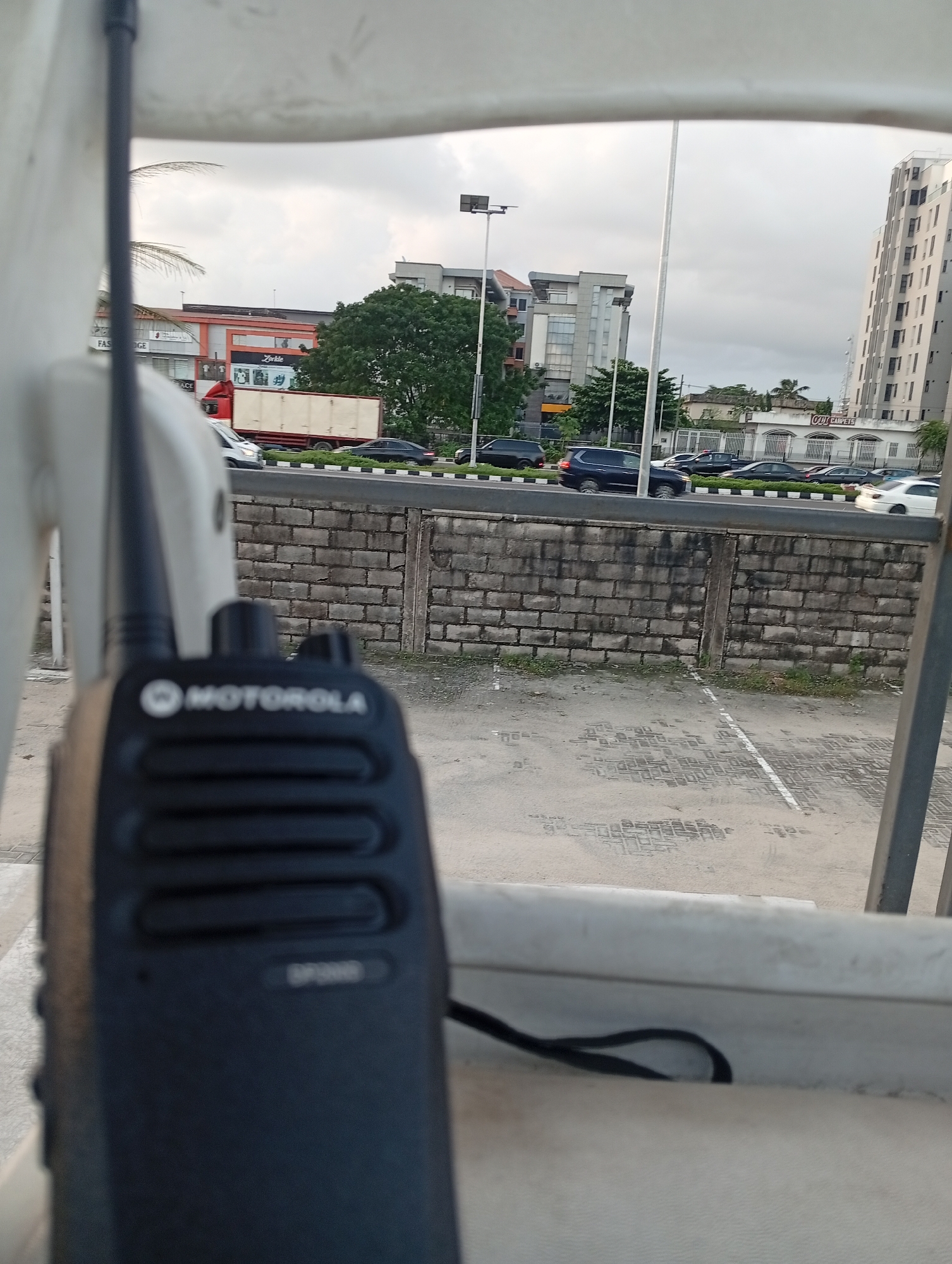 Urban street scenes with a walkie-talkie in the foreground