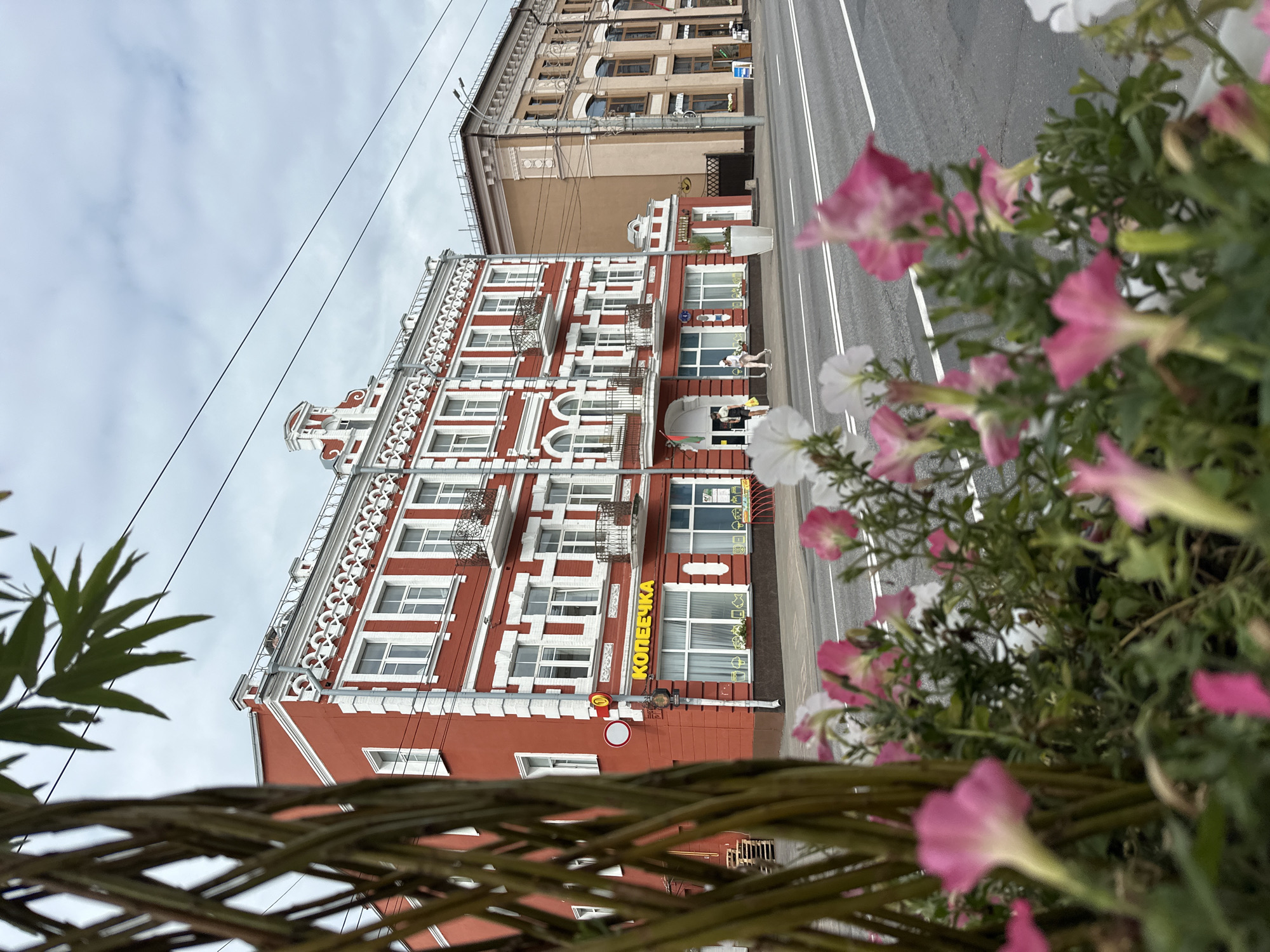 Street scenes and a fountain statue in central Homyel, Belarus