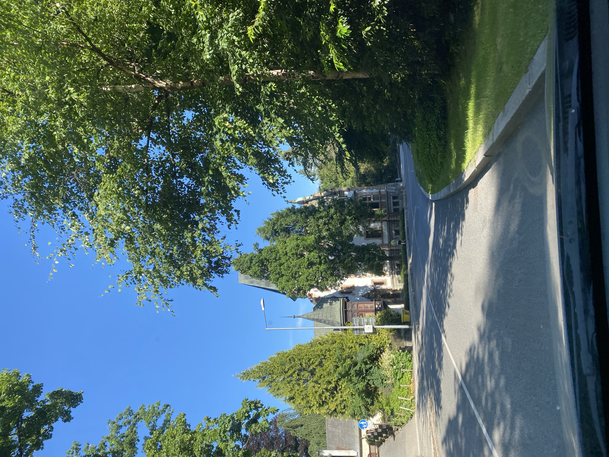 Sunny afternoon drive through suburban streets and urban murals