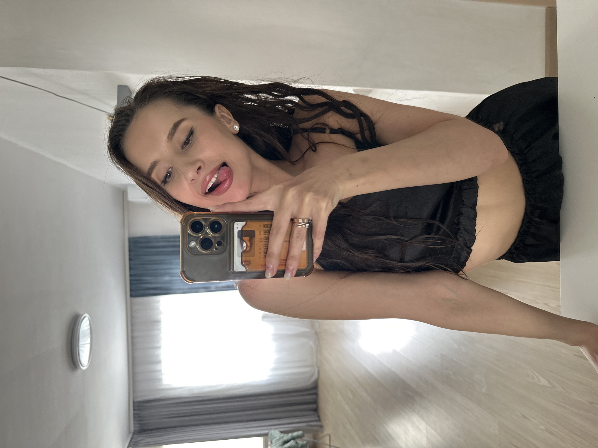 Woman takes selfies in Yekaterinburg apartment Monday morning