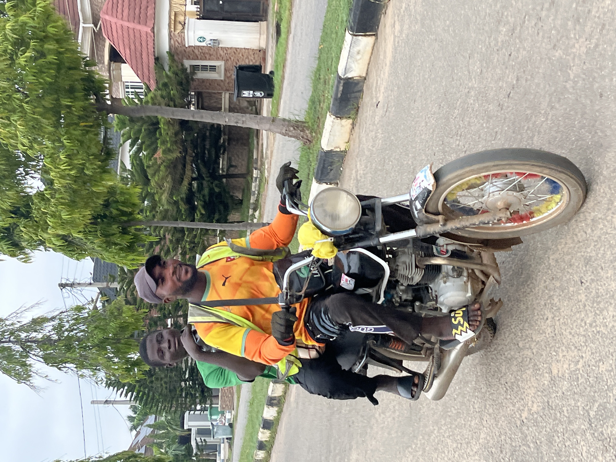 Early morning street life on a residential road in Abuja