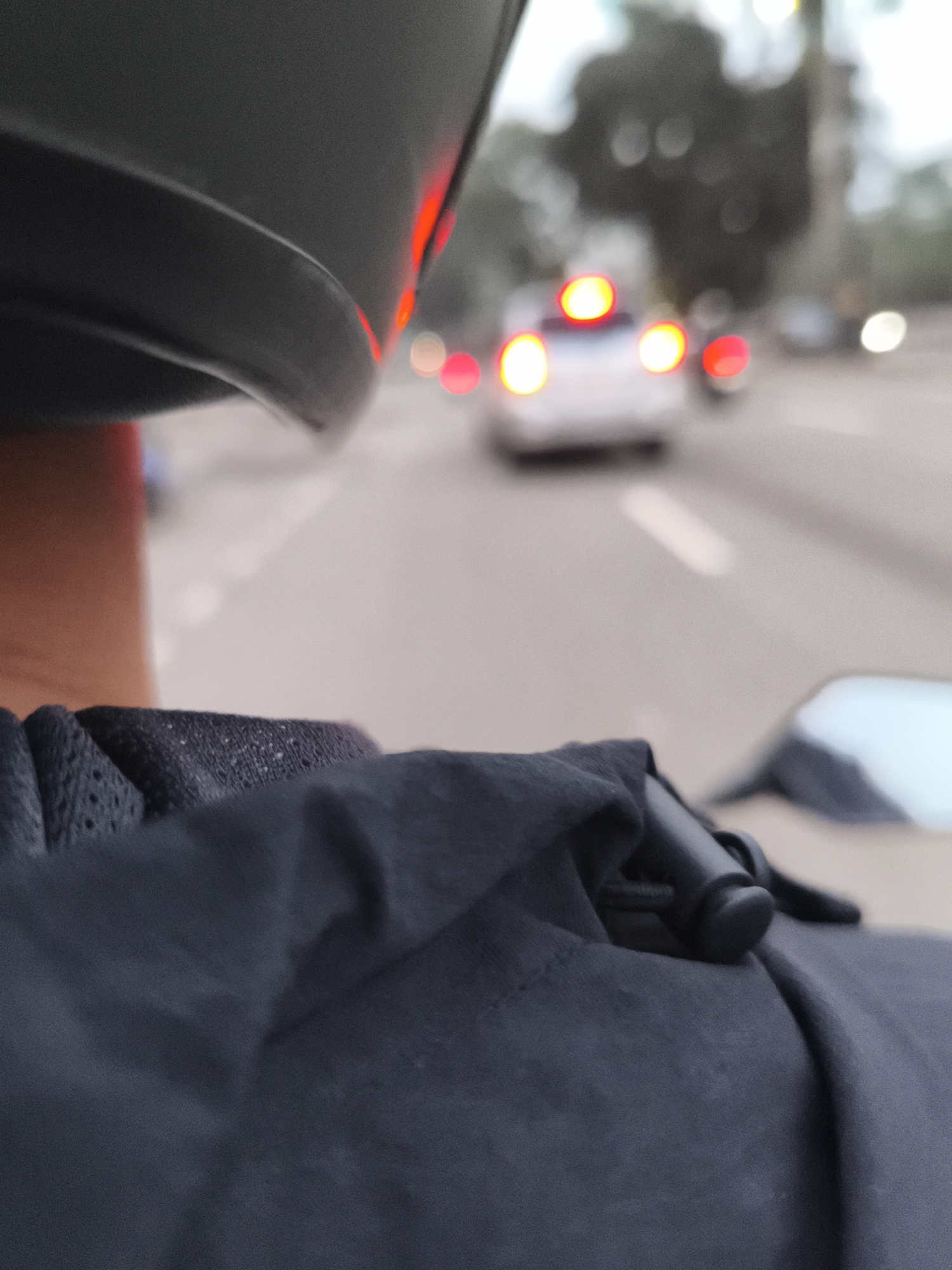 Motorcycle ride documented from passenger view in Sukaraja